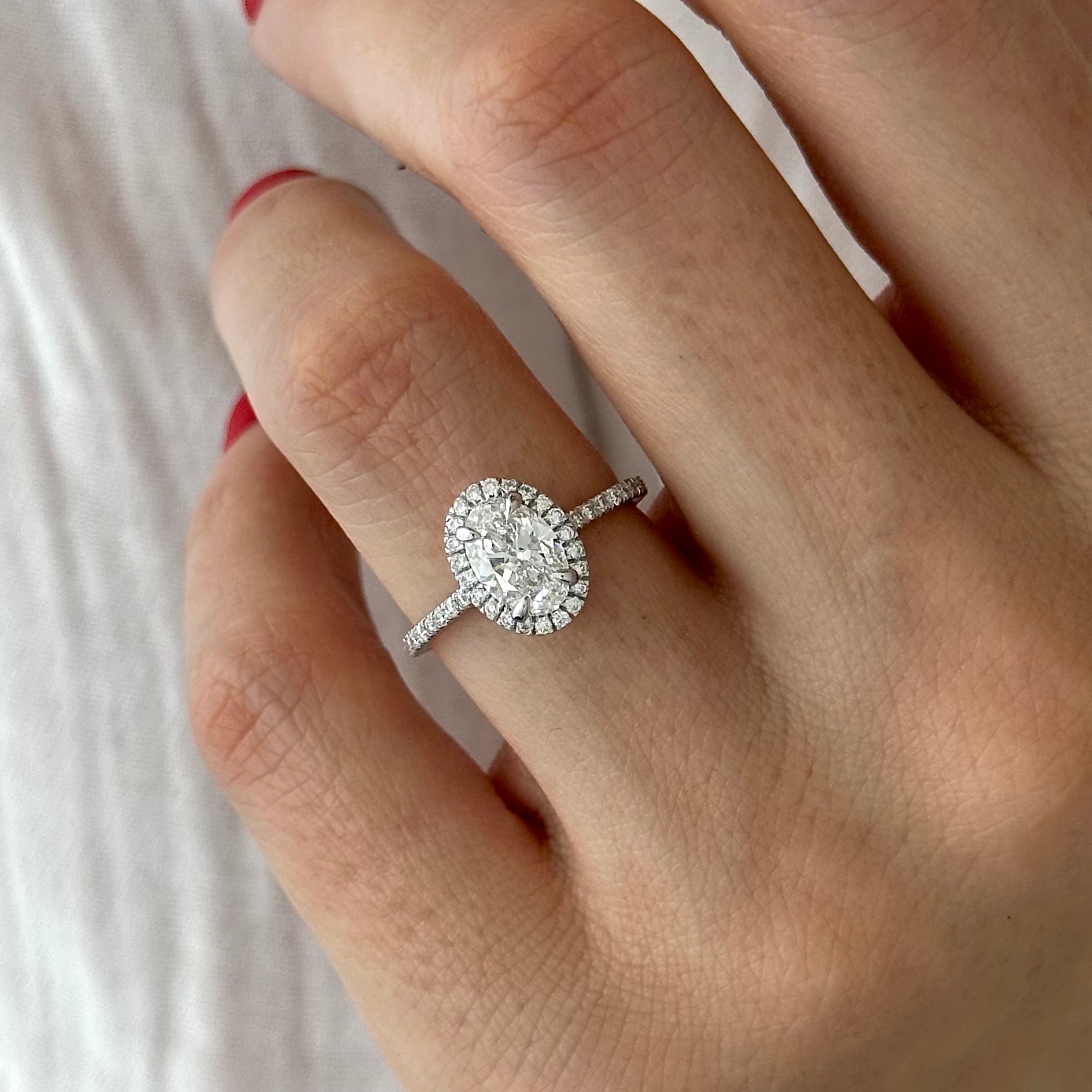 all-groups | 1 carat Oval cut lab-grown diamond IGI certified, hidden halo engagement ring.