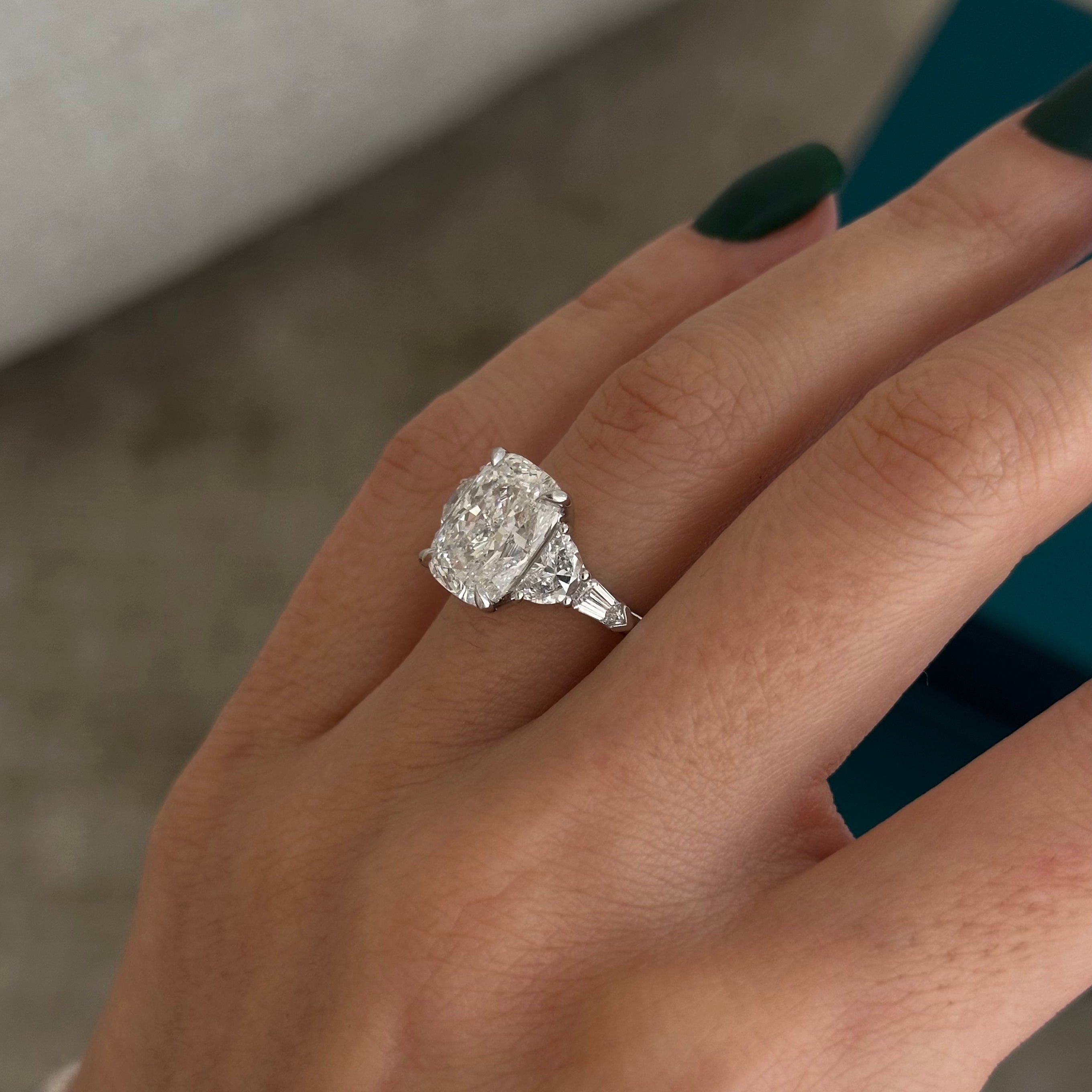 2.5 carat Emerald cut lab-grown diamond IGI certified, three stone engagement ring.