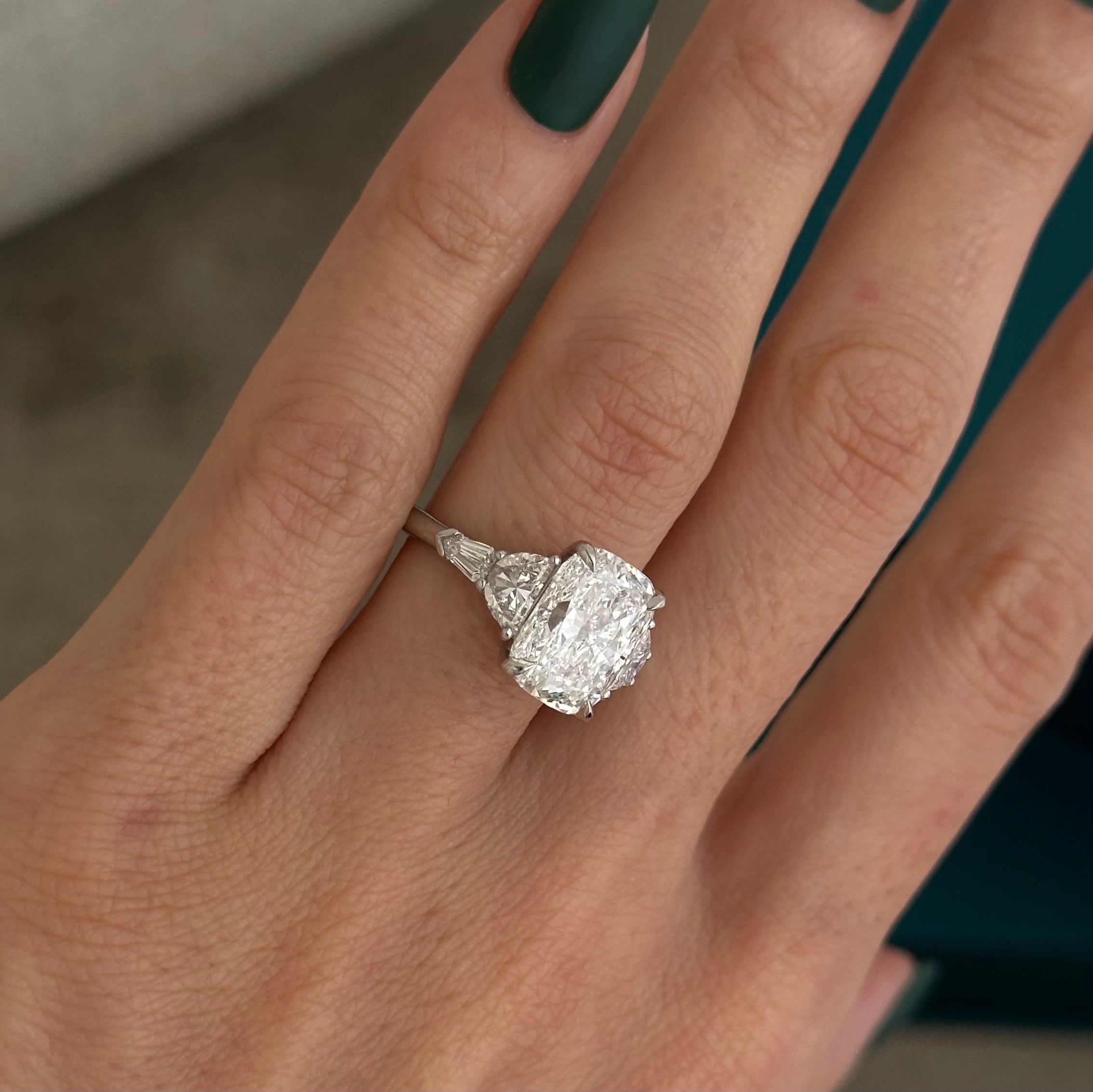 2.5 carat Emerald cut lab-grown diamond IGI certified, three stone engagement ring.