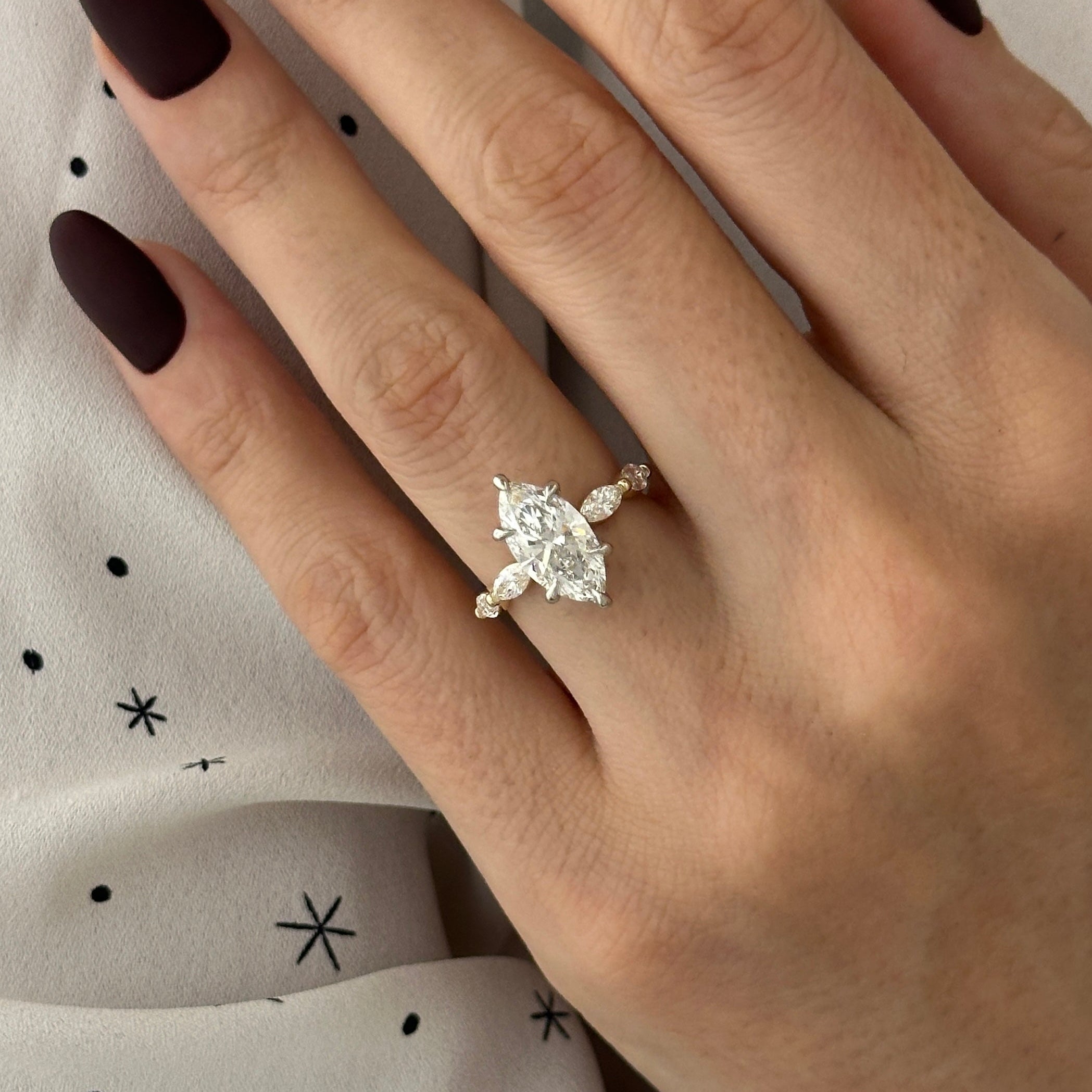 all-groups | 1 carat Marquise cut lab-grown diamond IGI certified, side stones engagement ring.