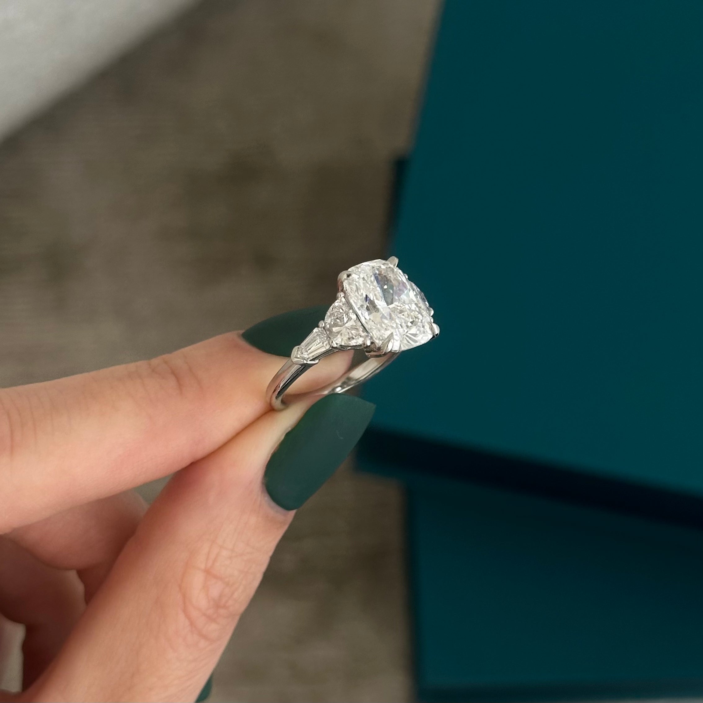 2.5 carat Emerald cut lab-grown diamond IGI certified, three stone engagement ring.
