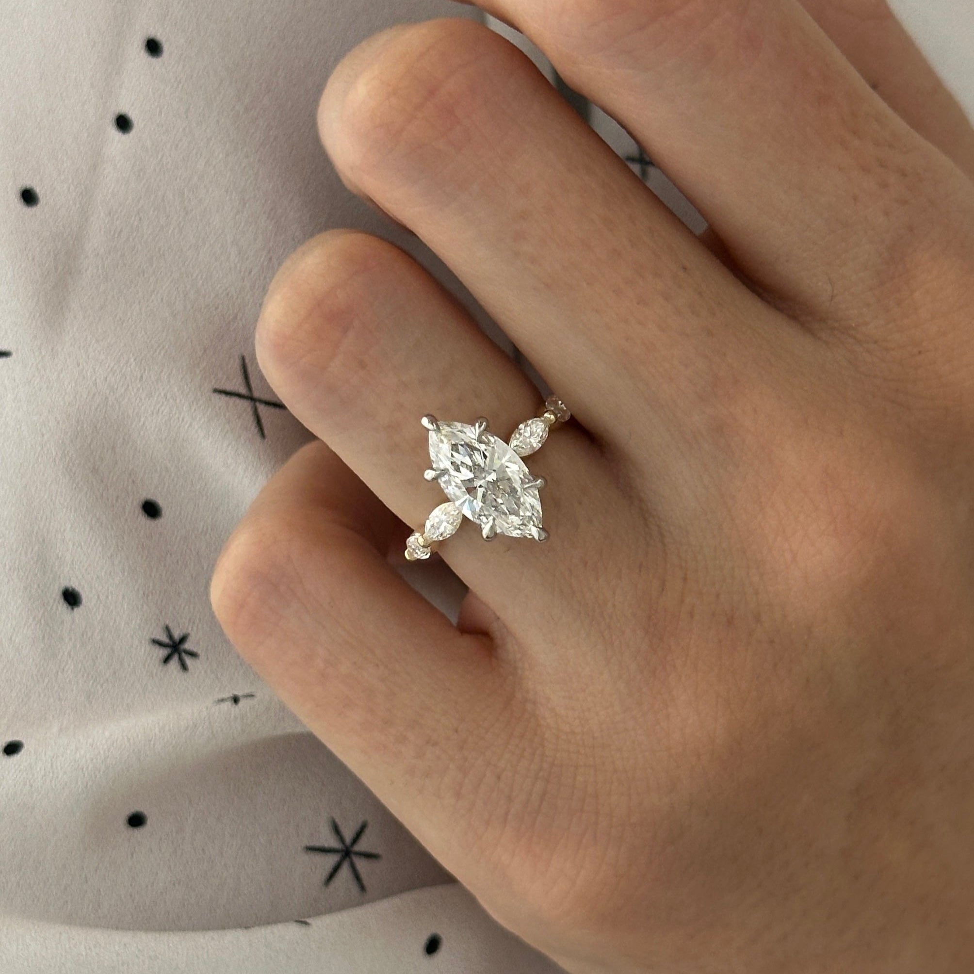 all-groups | 1 carat Marquise cut lab-grown diamond IGI certified, side stones engagement ring.