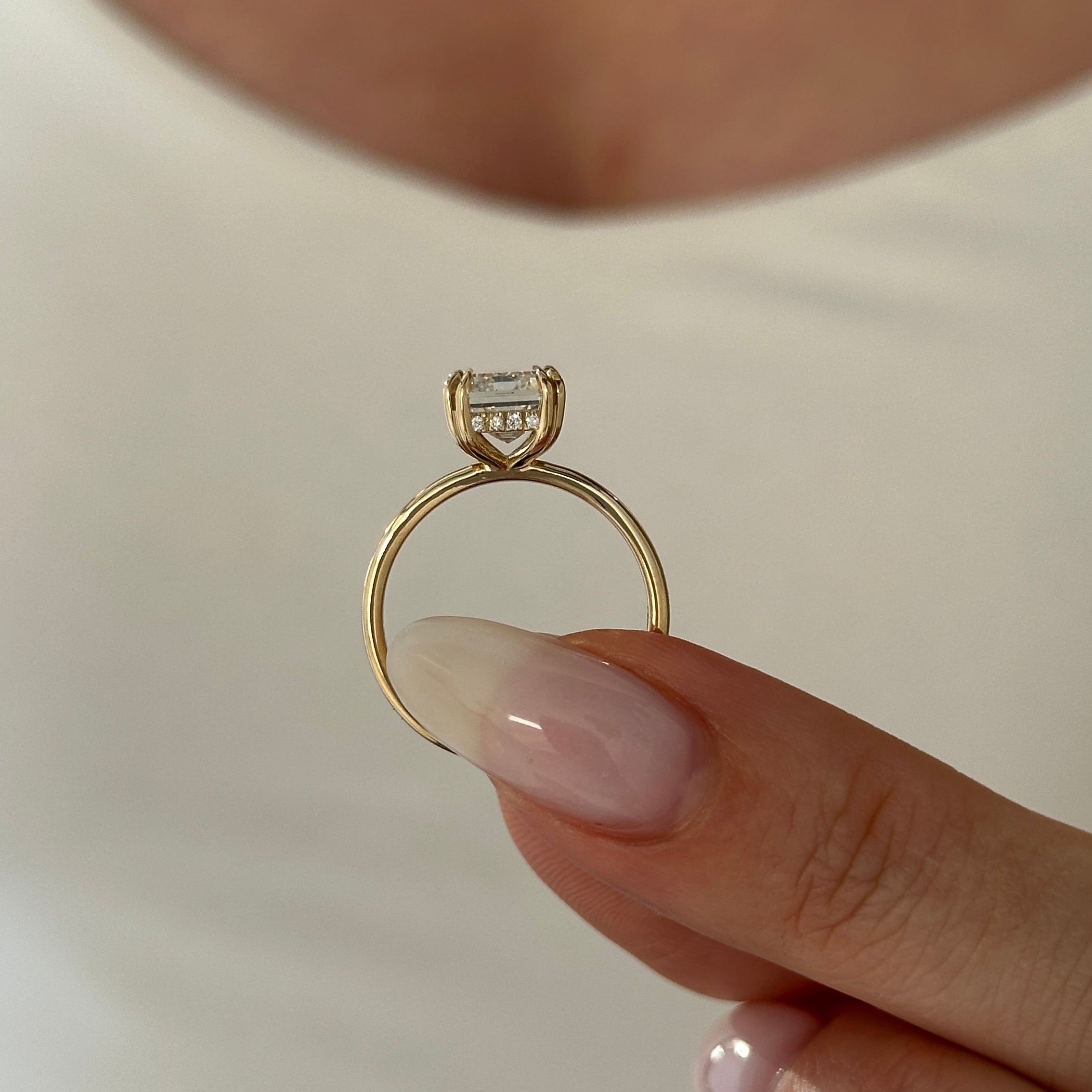 3 carat Emerald cut lab-grown diamond IGI certified, hidden halo engagement ring.