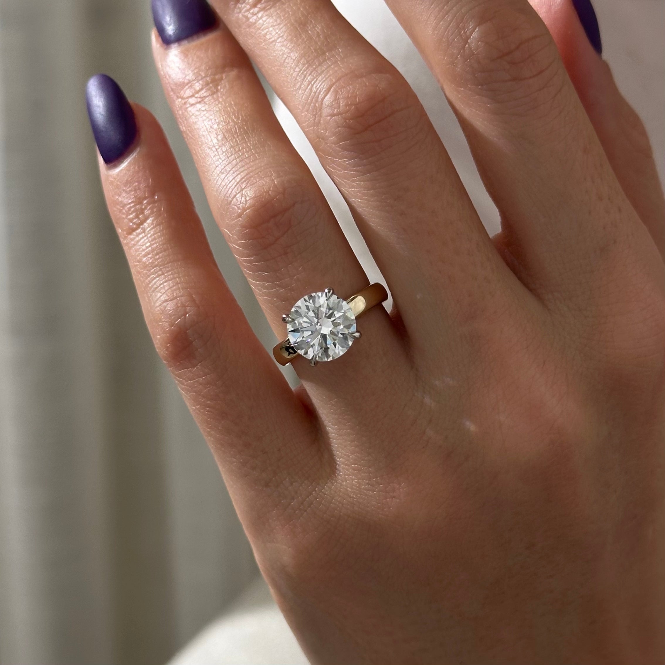 2 carat Round Brilliant cut lab-grown diamond IGI certified, hidden halo engagement ring.