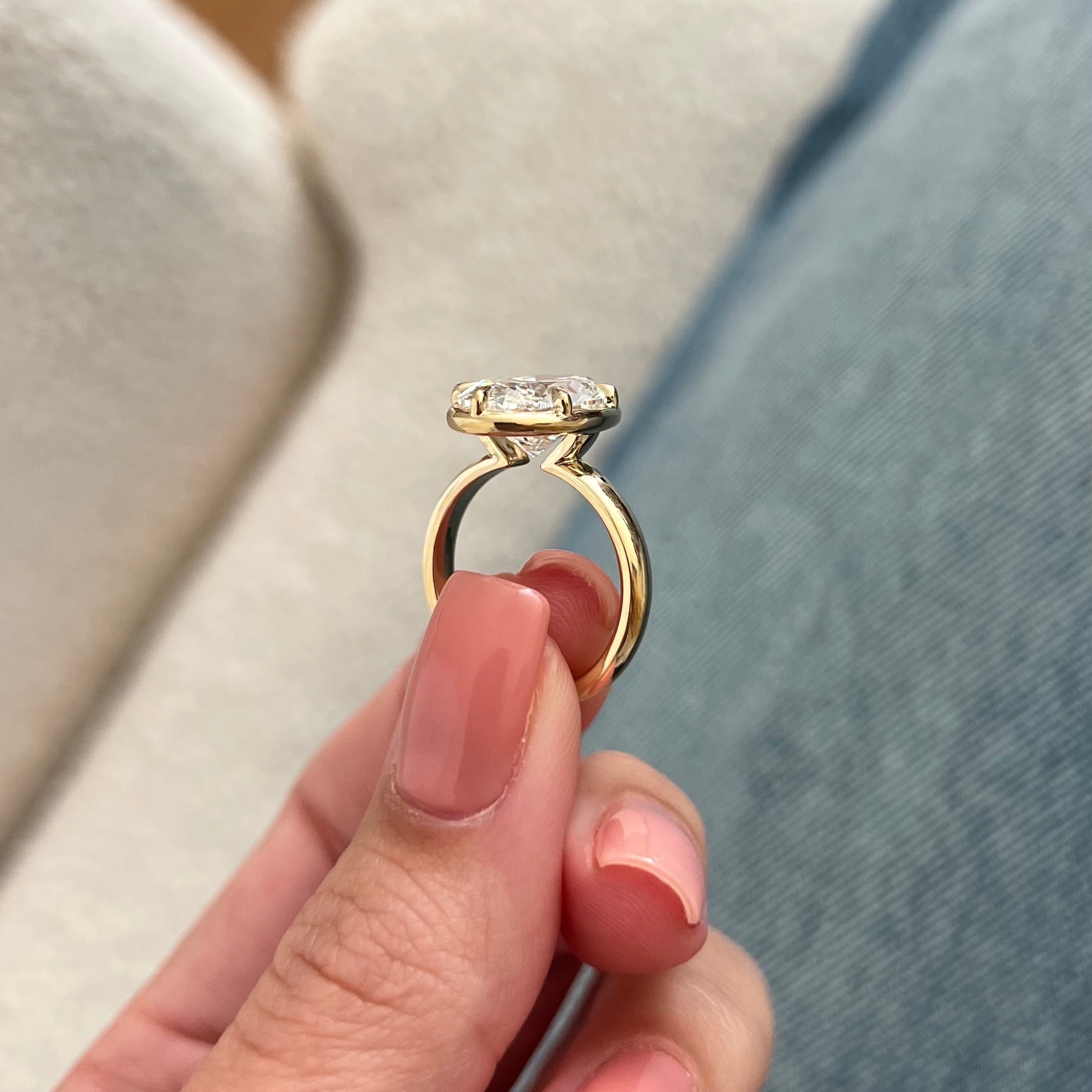 5 carat Oval cut lab-grown diamond IGI certified, bezel engagement ring.