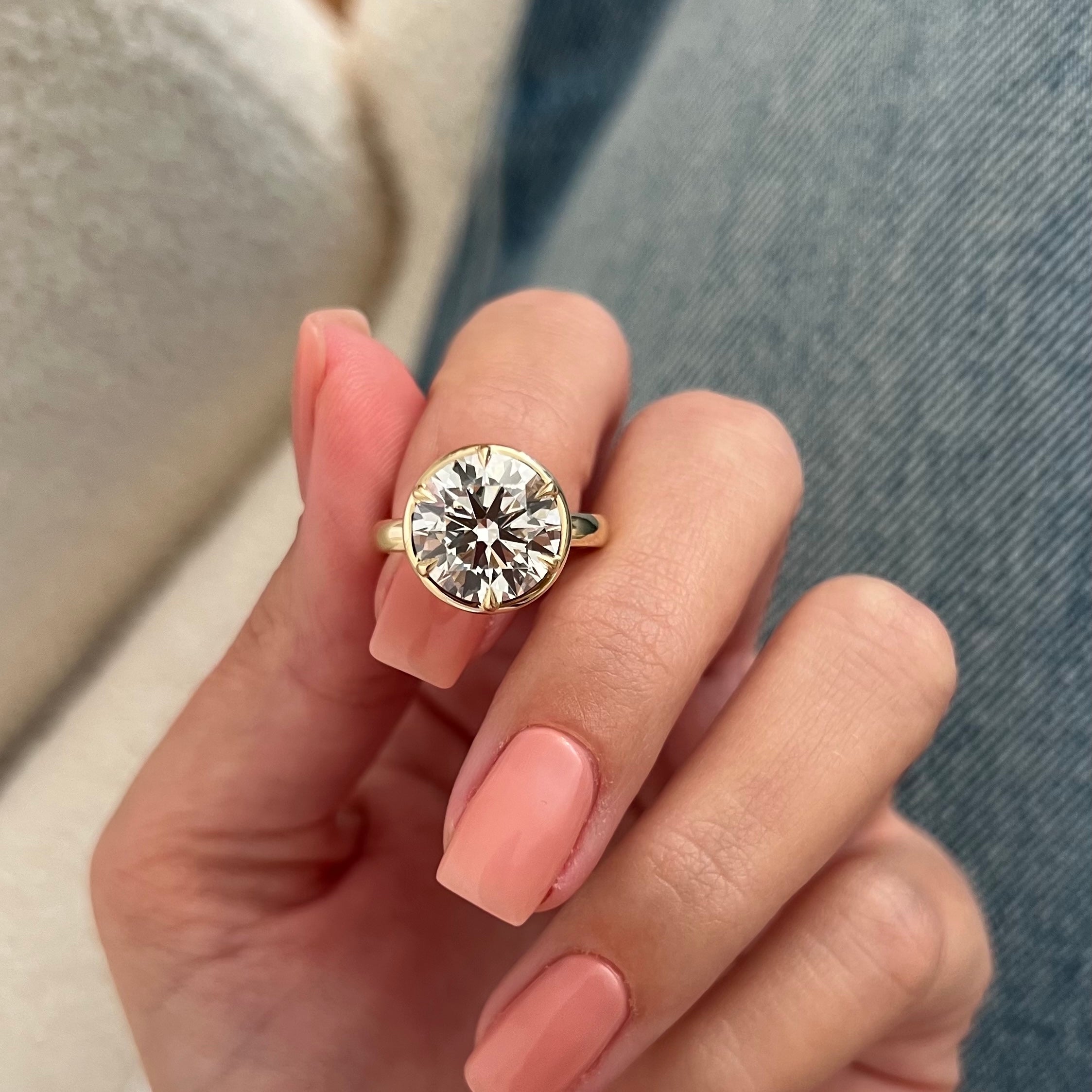 5 carat Oval cut lab-grown diamond IGI certified, bezel engagement ring.