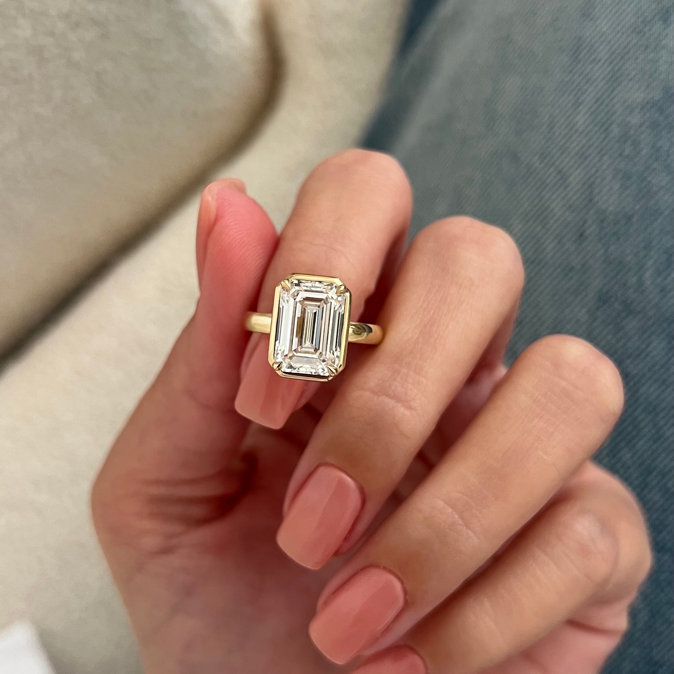 5 carat Oval cut lab-grown diamond IGI certified, bezel engagement ring.