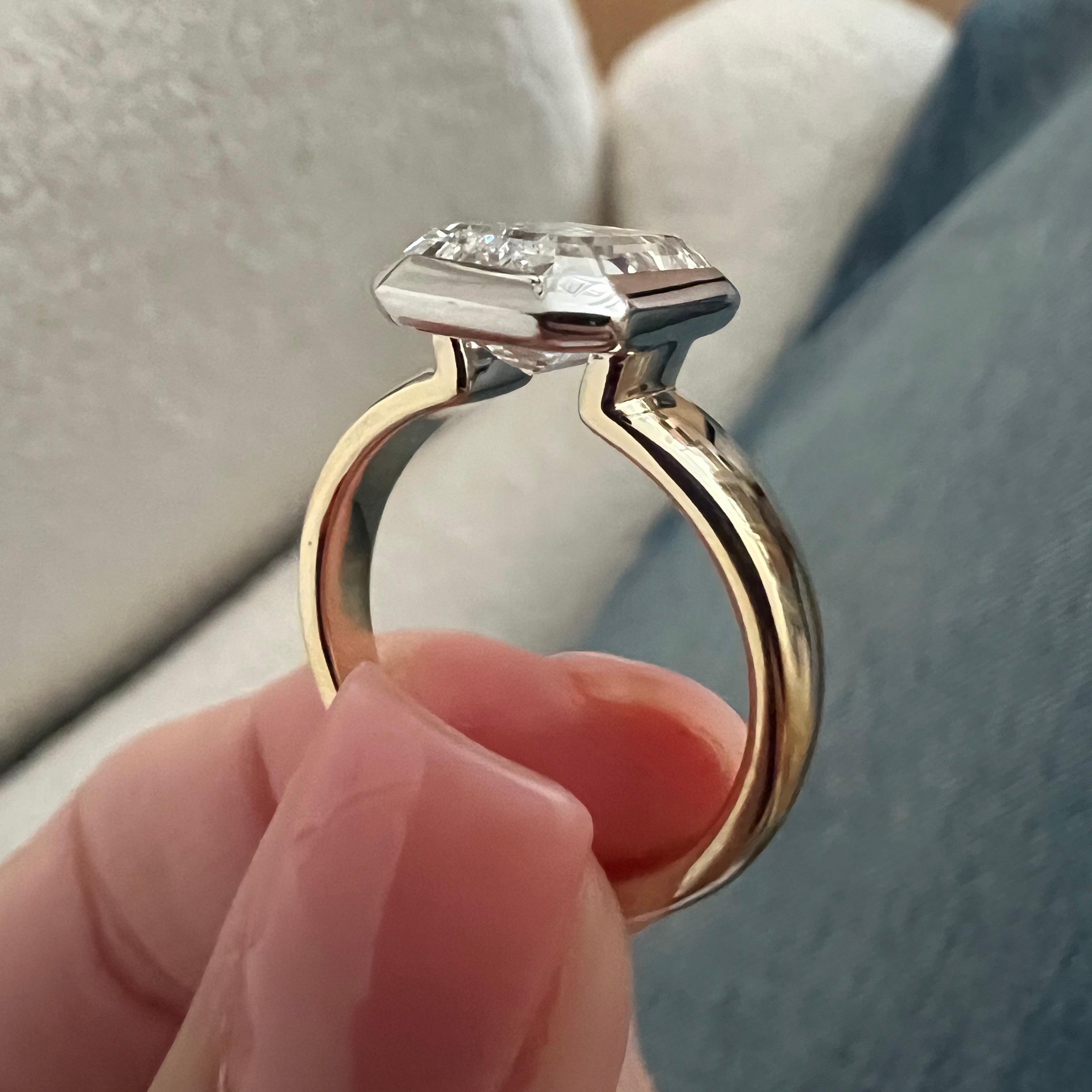 3 carat Oval cut lab-grown diamond IGI certified, bezel engagement ring.