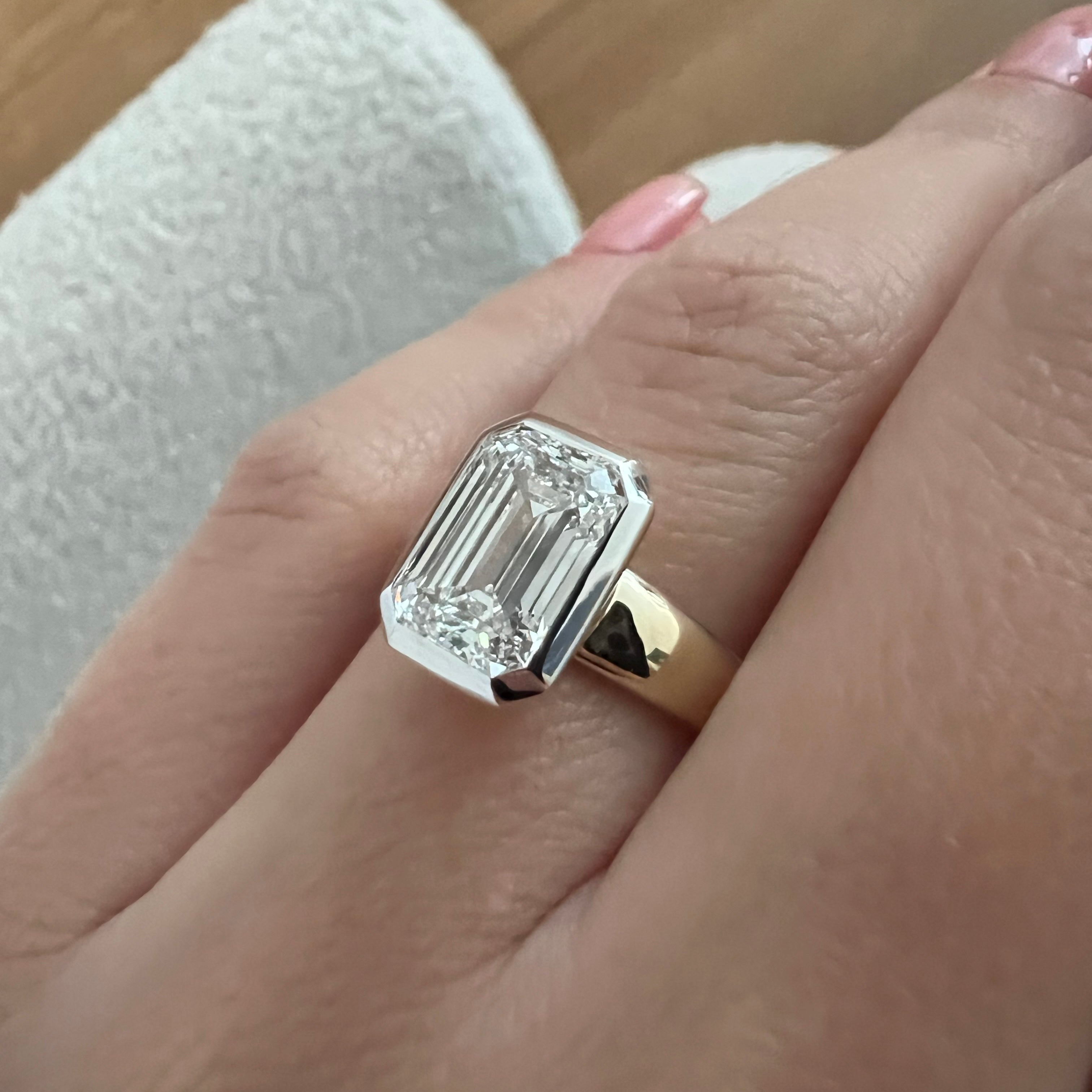 3 carat Oval cut lab-grown diamond IGI certified, bezel engagement ring.