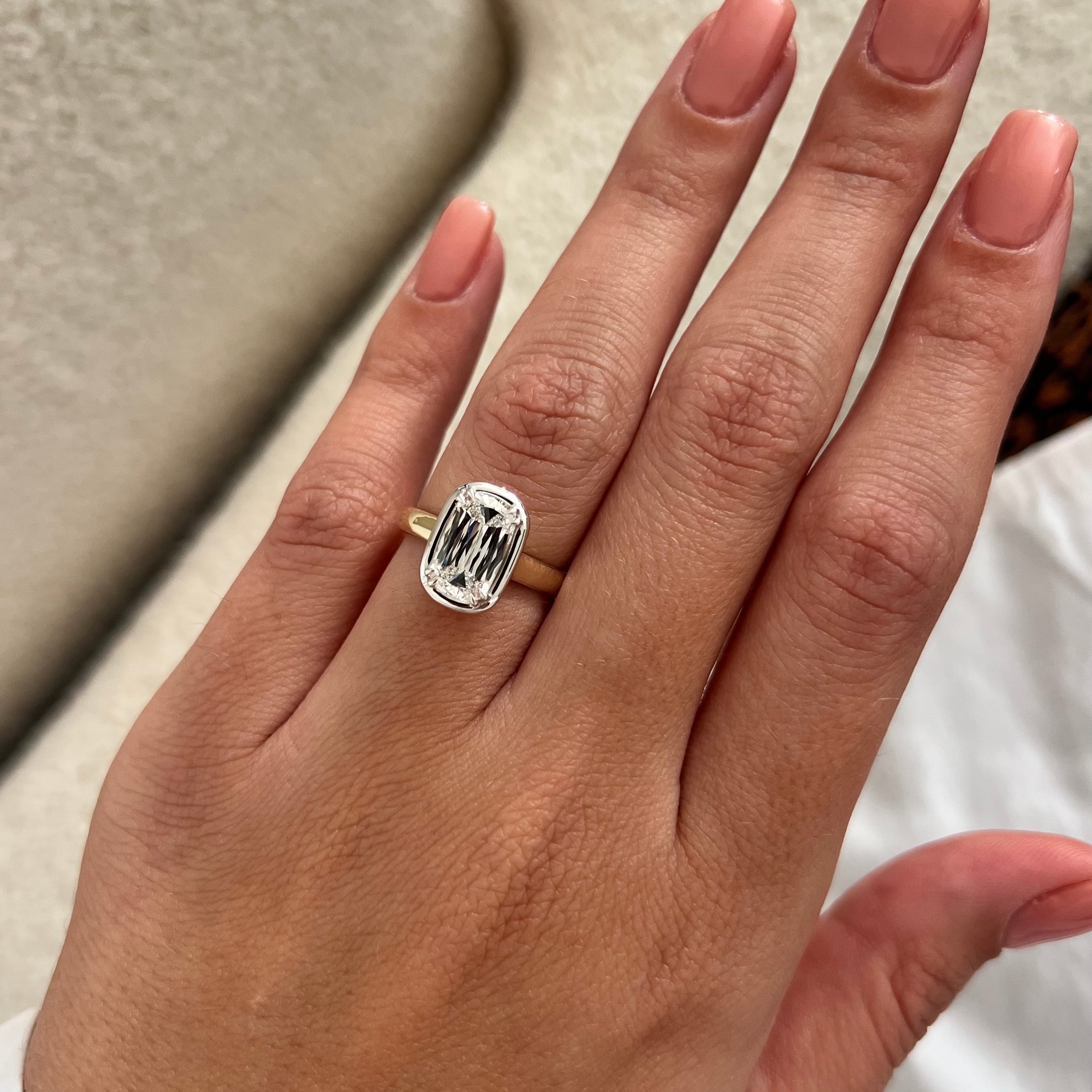 2 carat Oval cut lab-grown diamond IGI certified, bezel engagement ring.