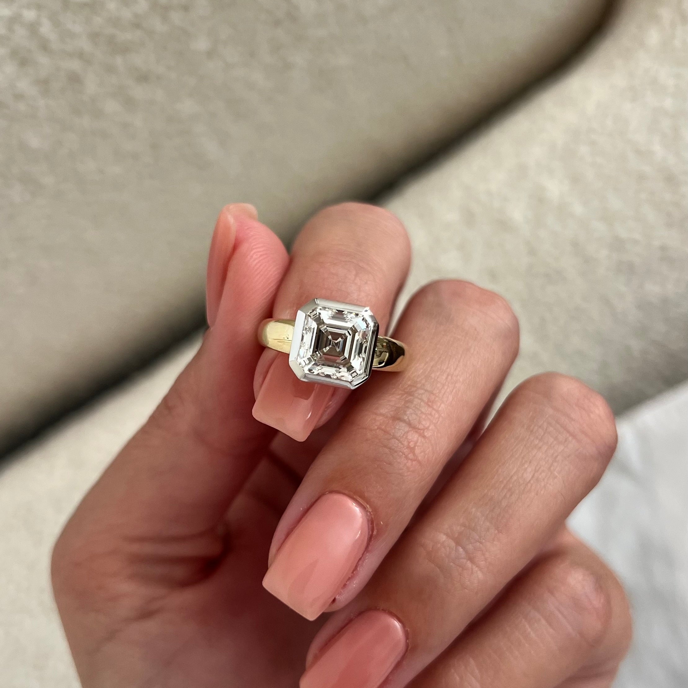 3 carat Oval cut lab-grown diamond IGI certified, bezel engagement ring.