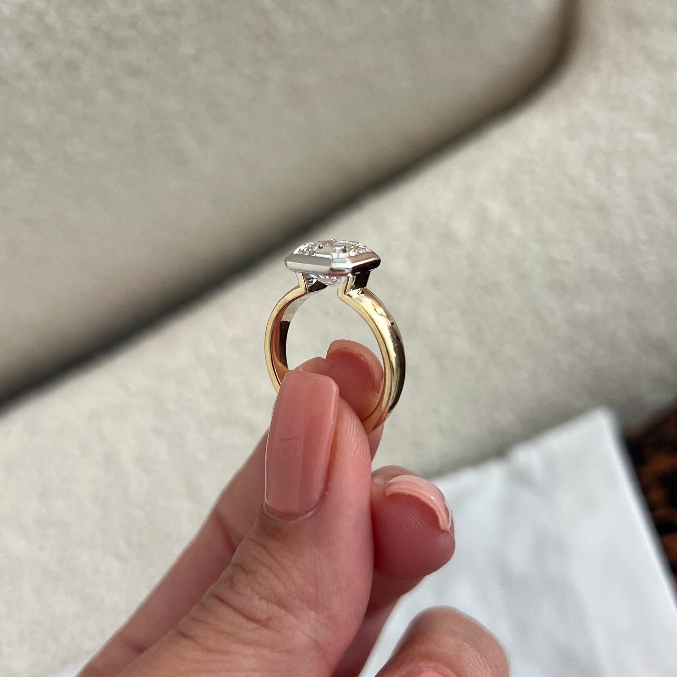 3 carat Oval cut lab-grown diamond IGI certified, bezel engagement ring.
