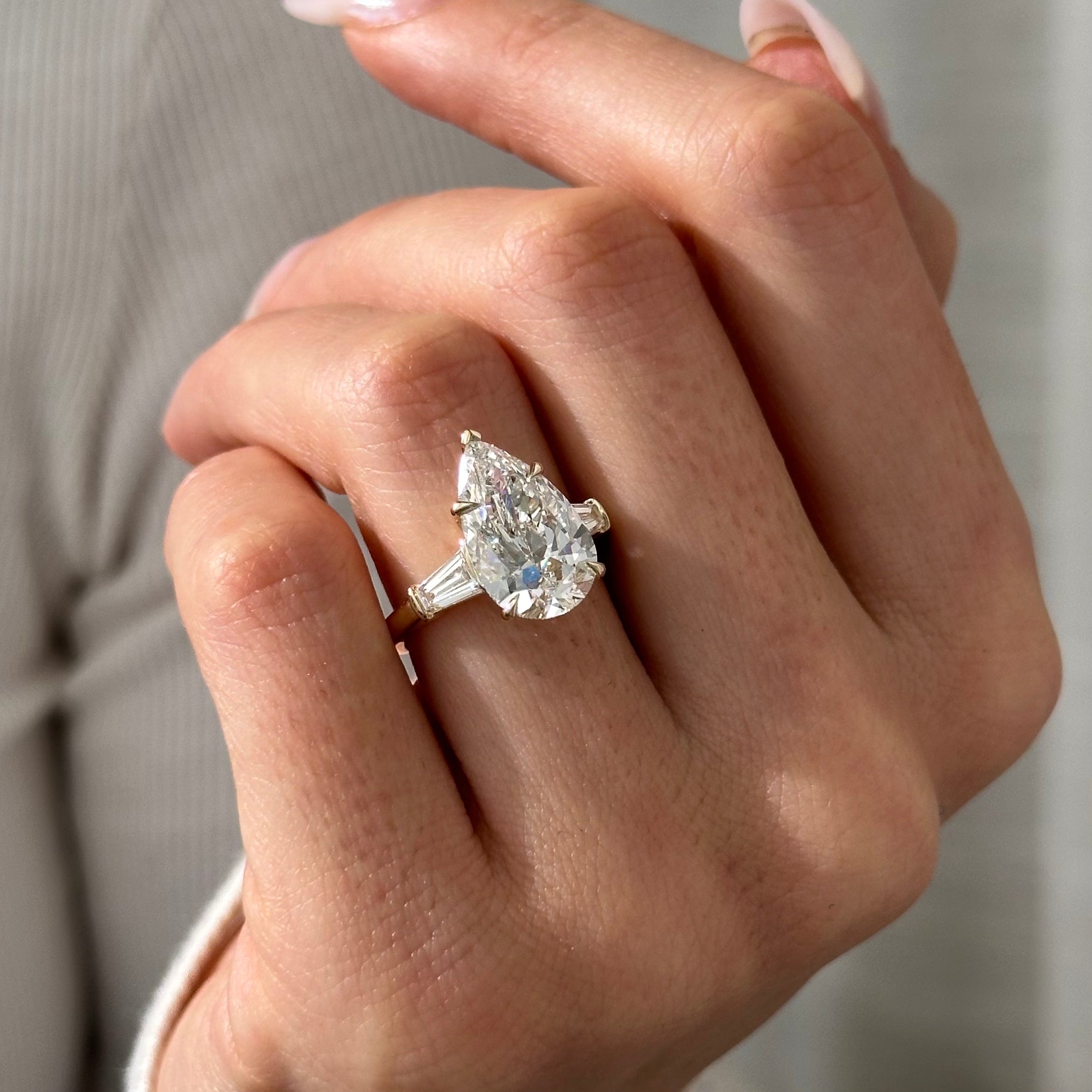 5 carat Pear cut lab-grown diamond IGI certified, three stone engagement ring.