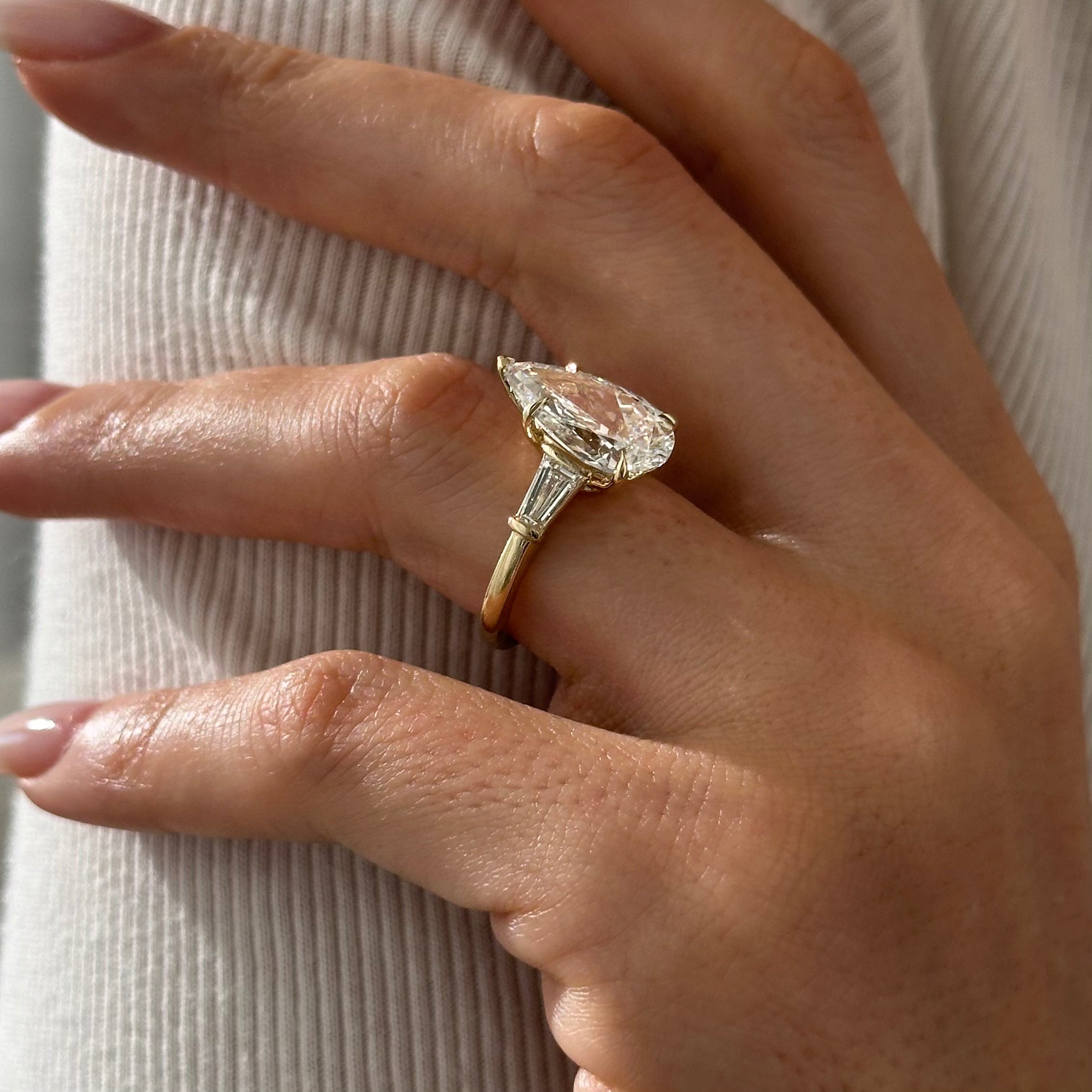 5 carat Pear cut lab-grown diamond IGI certified, three stone engagement ring.