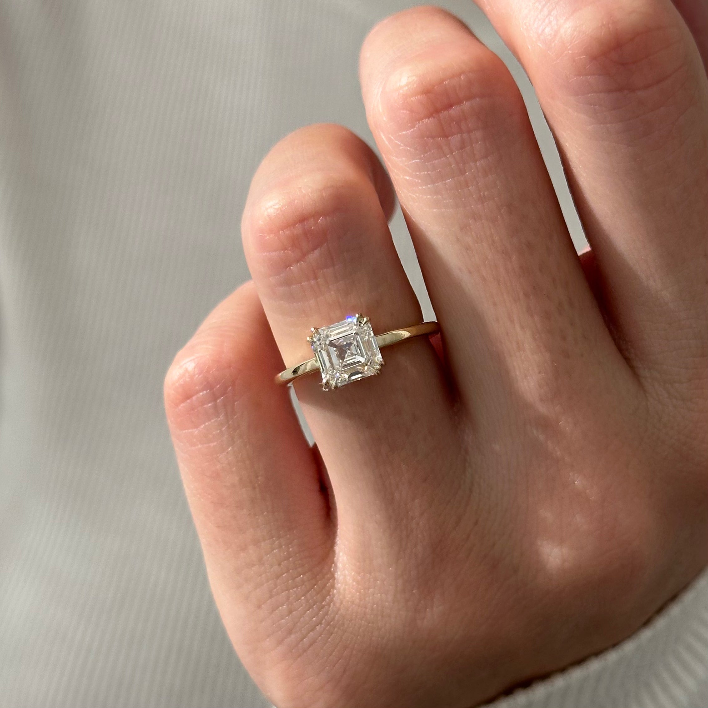 all-groups | 2 carat Asscher cut lab-grown diamond IGI certified, solitaire engagement ring.