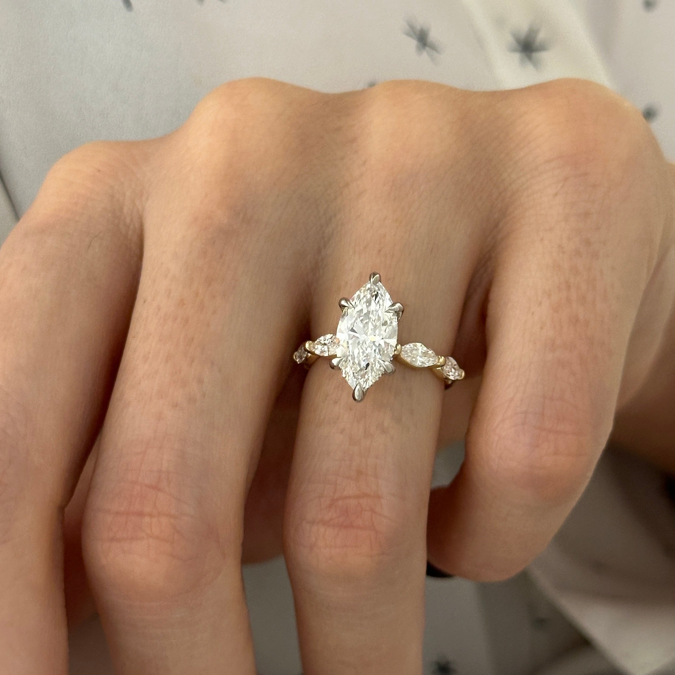 all-groups | 1 carat Marquise cut lab-grown diamond IGI certified, side stones engagement ring.