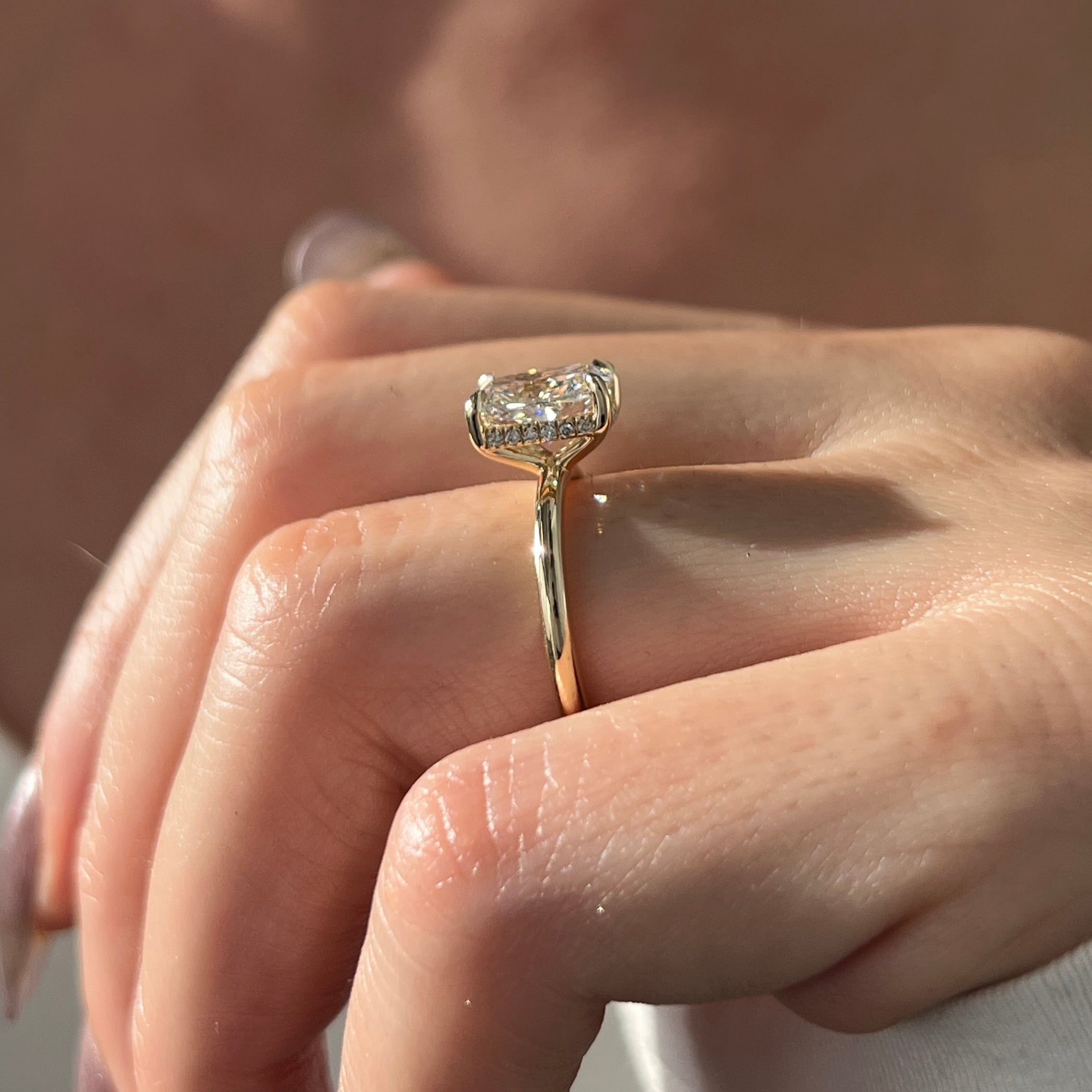 3 carat Oval cut lab-grown diamond IGI certified, hidden halo engagement ring.