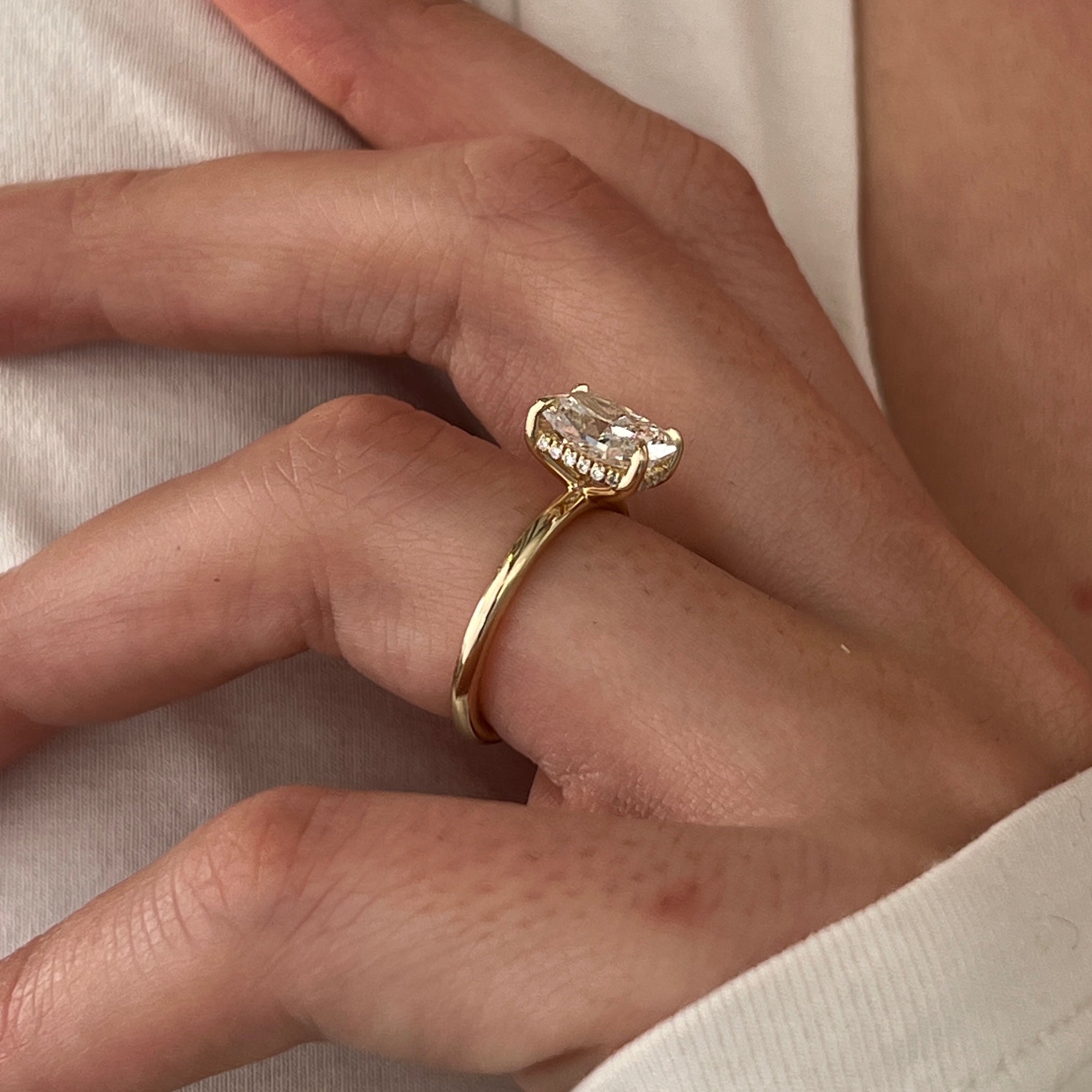 3 carat Oval cut lab-grown diamond IGI certified, hidden halo engagement ring.