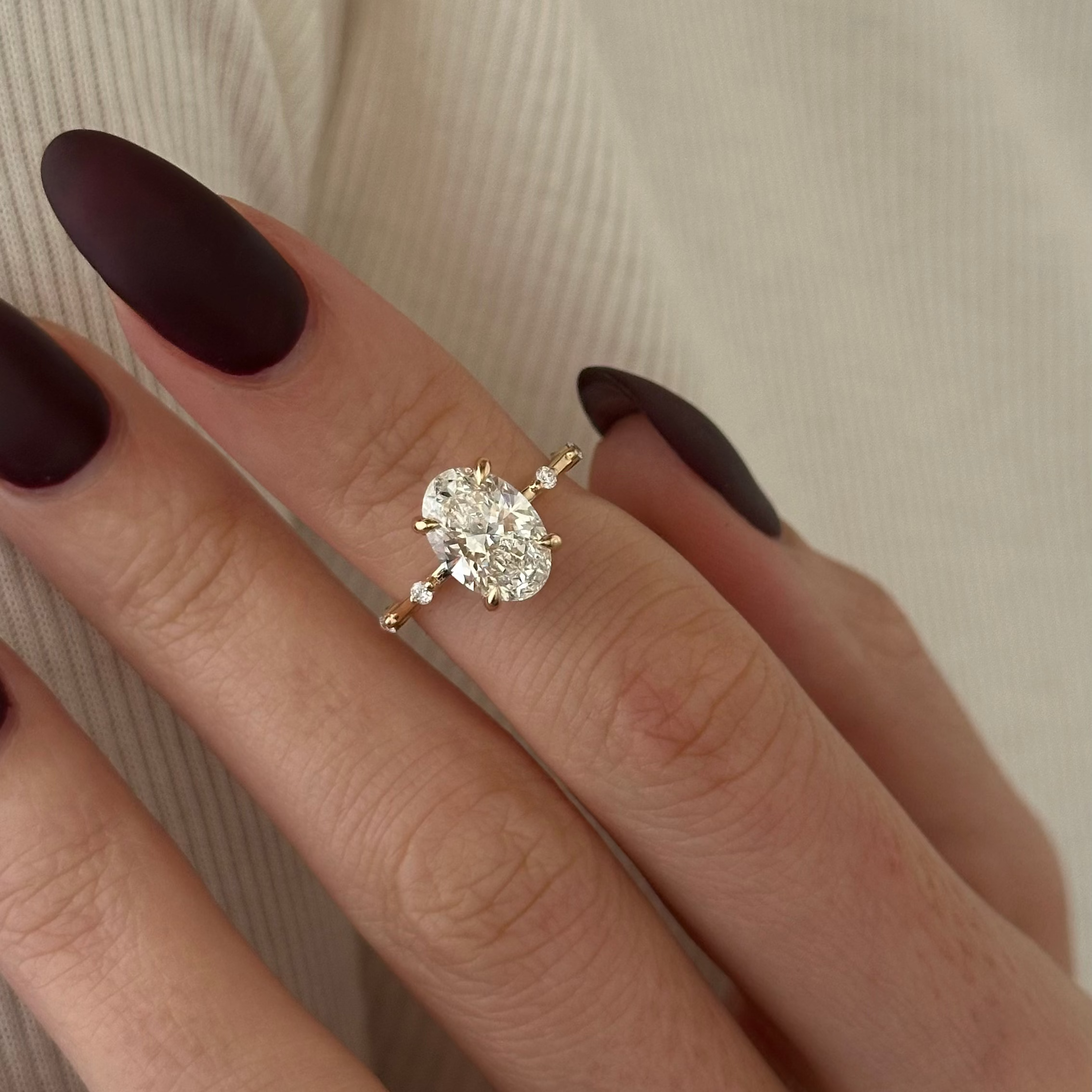 2 carat Oval cut lab-grown diamond IGI certified, hidden halo engagement ring.