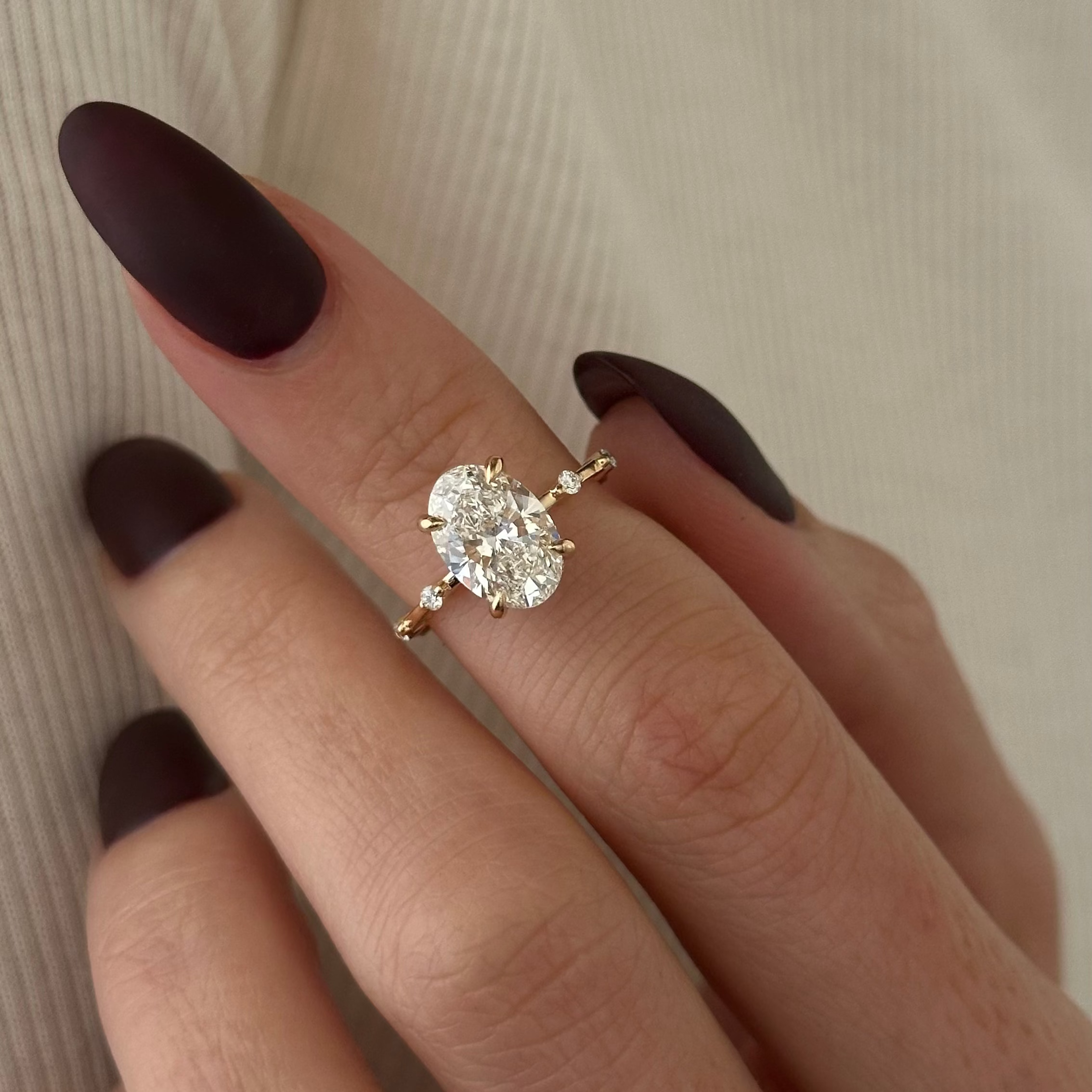 2 carat Oval cut lab-grown diamond IGI certified, hidden halo engagement ring.
