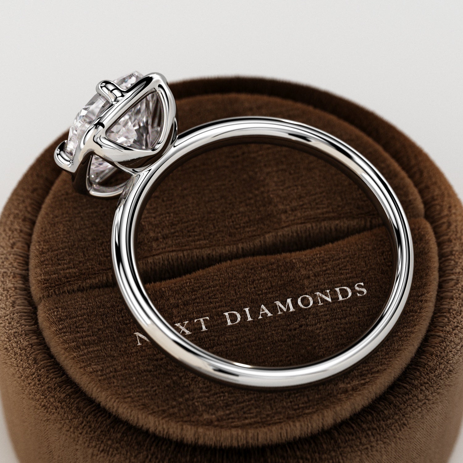 2 carat Cushion cut lab-grown diamond IGI certified, bezel engagement ring.