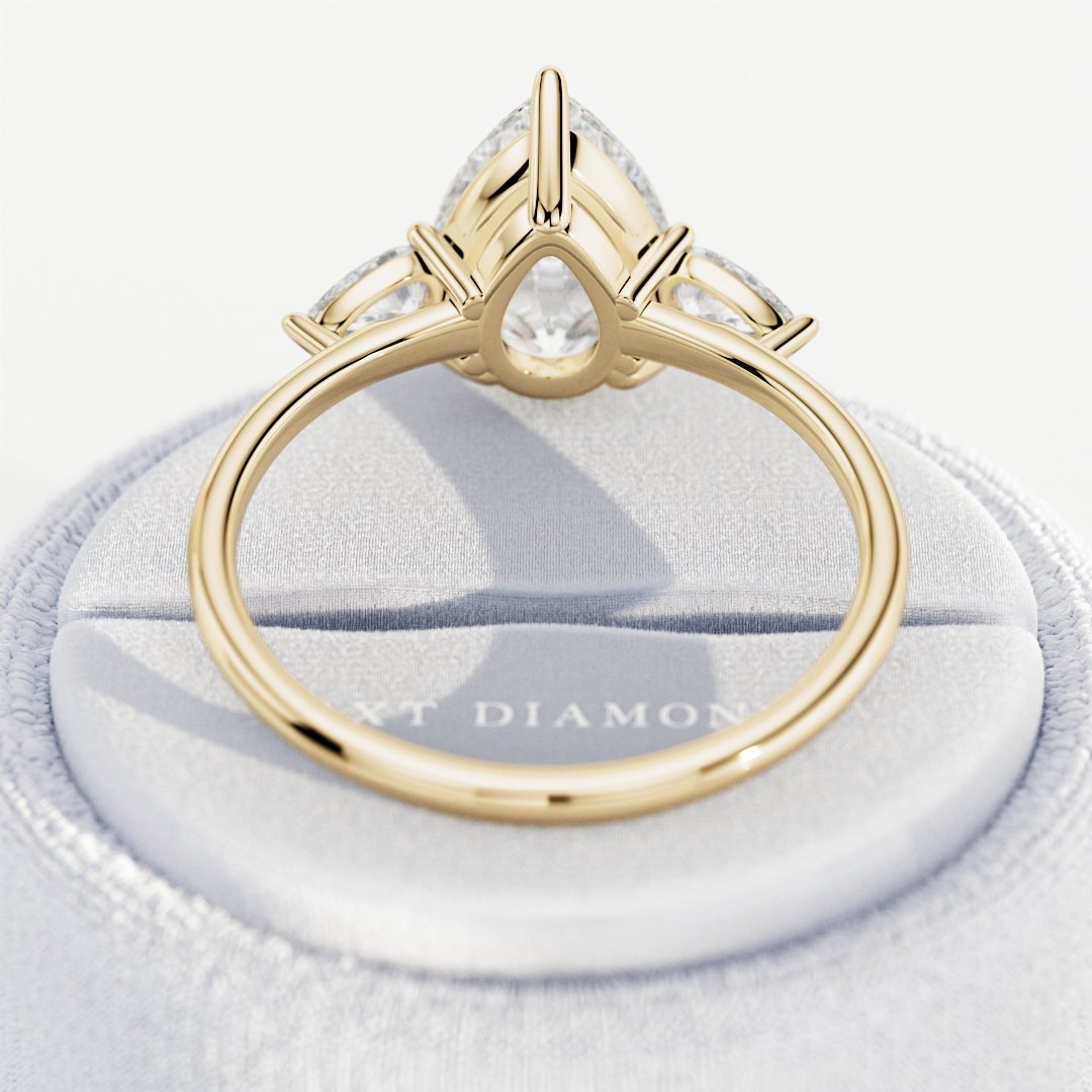 3 carat Pear cut lab-grown diamond IGI certified, three stone engagement ring.