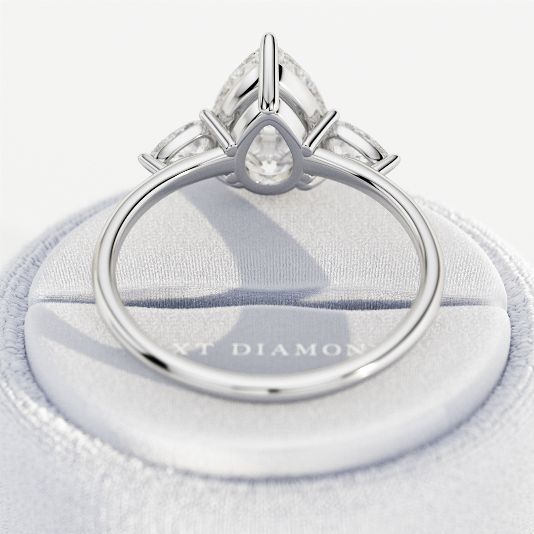 3 carat Pear cut lab-grown diamond IGI certified, three stone engagement ring.