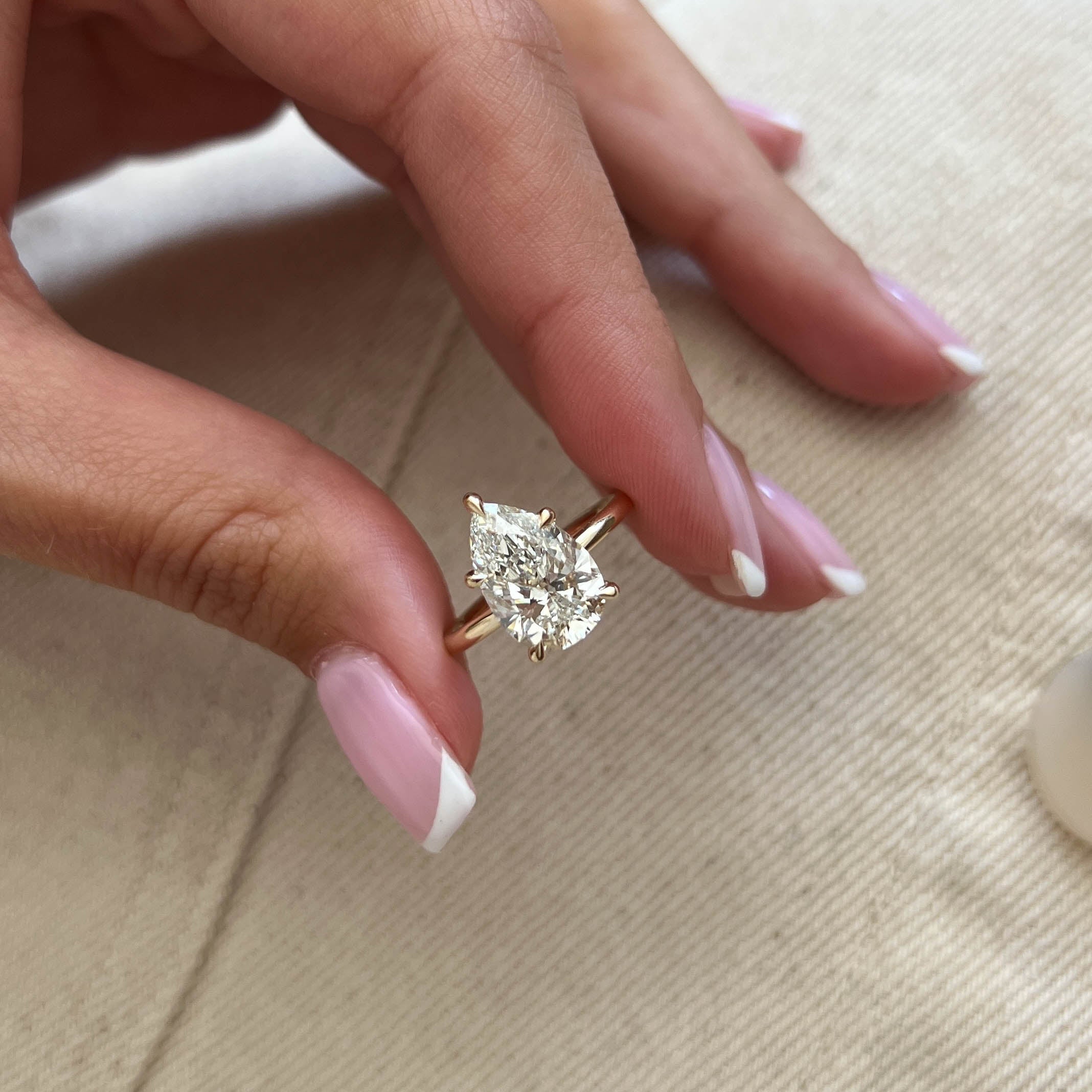 3 carat Pear cut lab-grown diamond IGI certified, solitaire engagement ring.