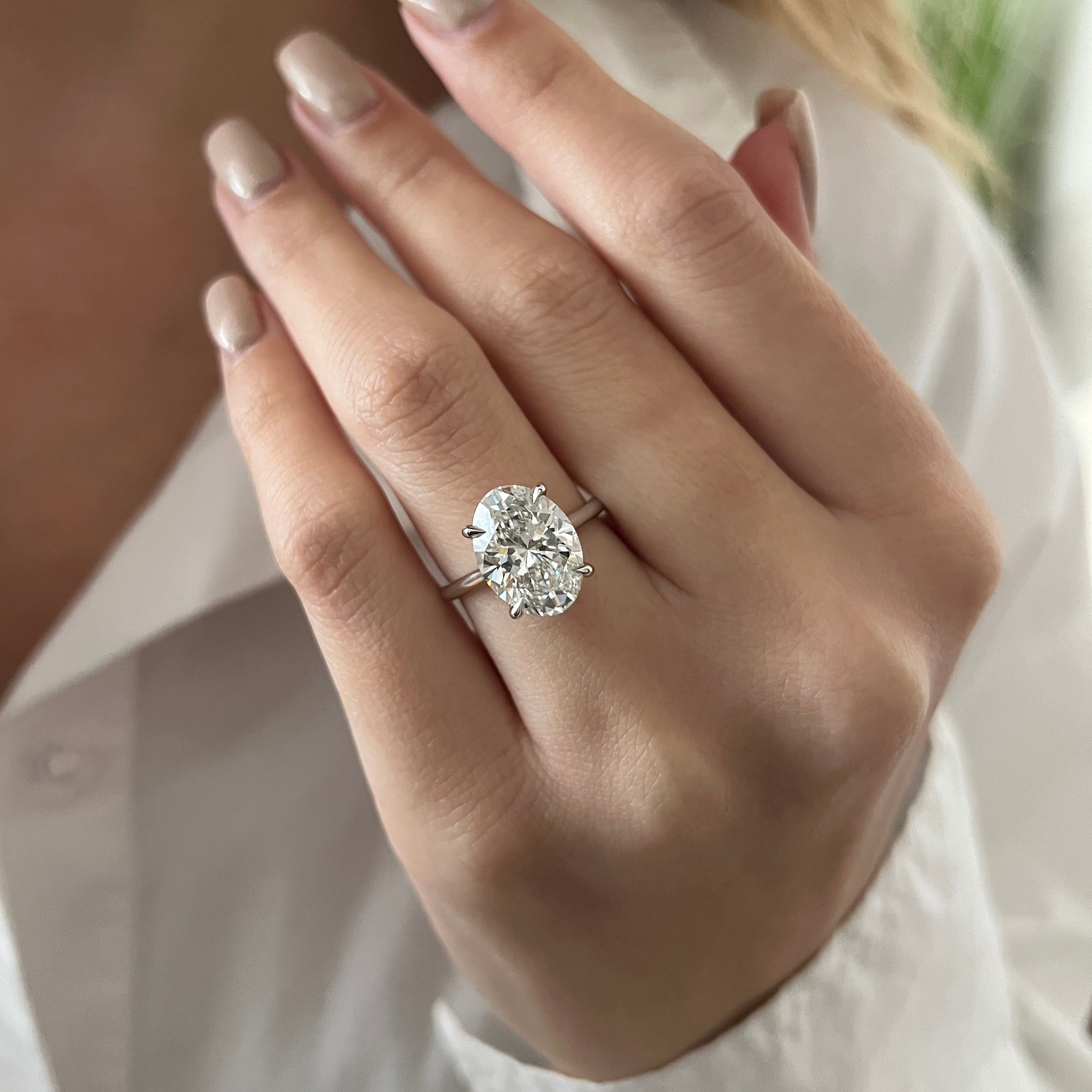 3 carat Oval cut lab-grown diamond IGI certified, engagement ring.