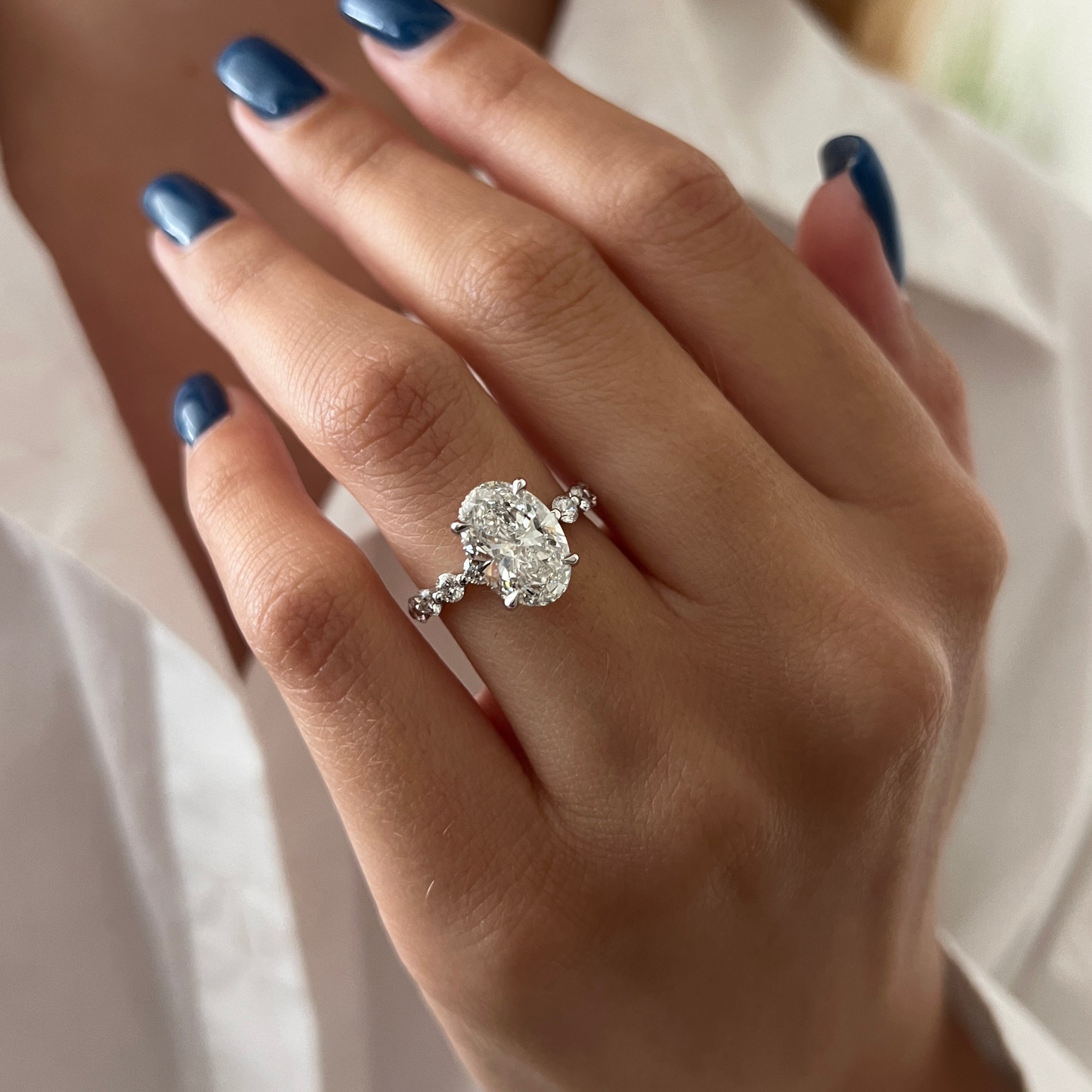 5 carat Oval cut lab-grown diamond IGI certified, side stones engagement ring.
