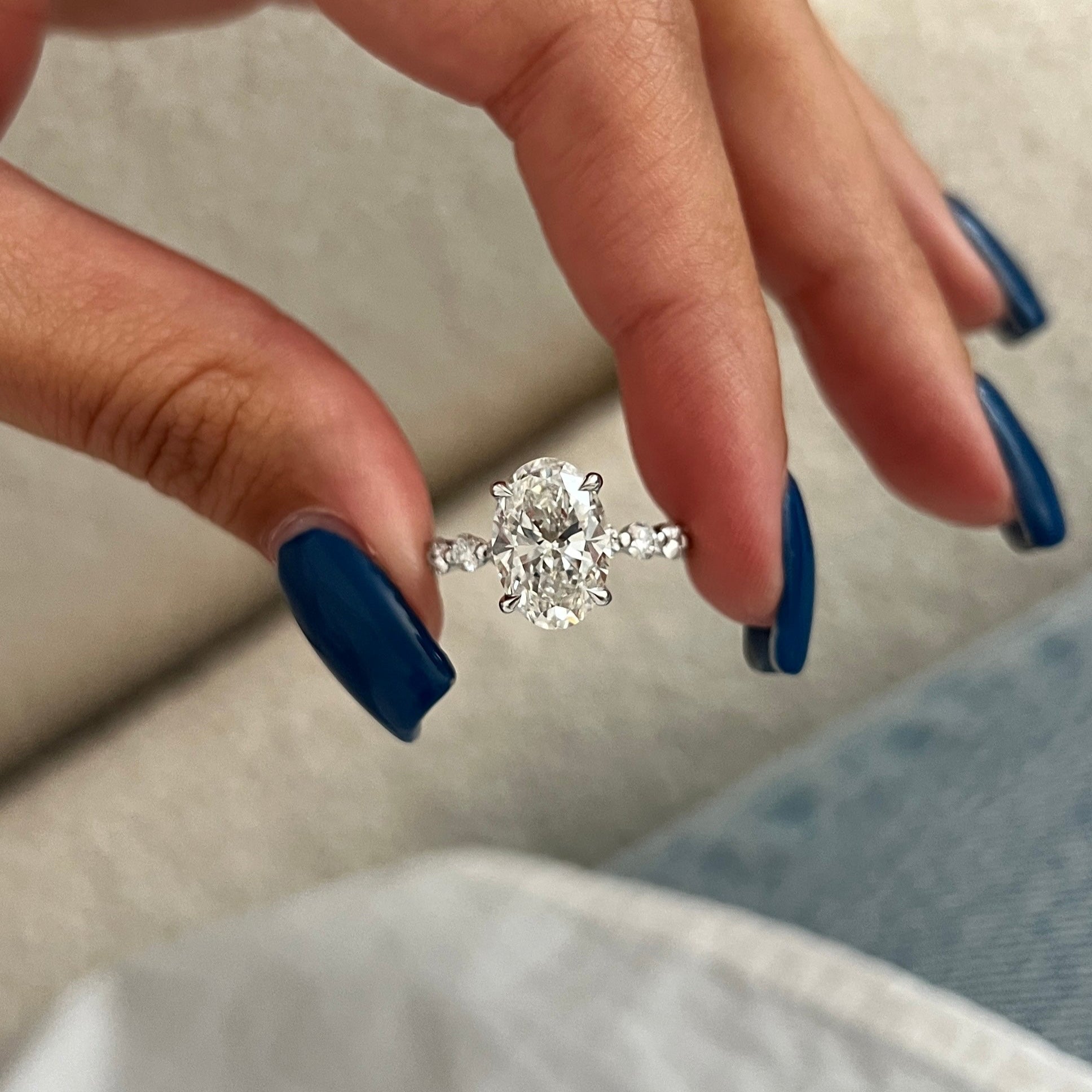 5 carat Oval cut lab-grown diamond IGI certified, side stones engagement ring.