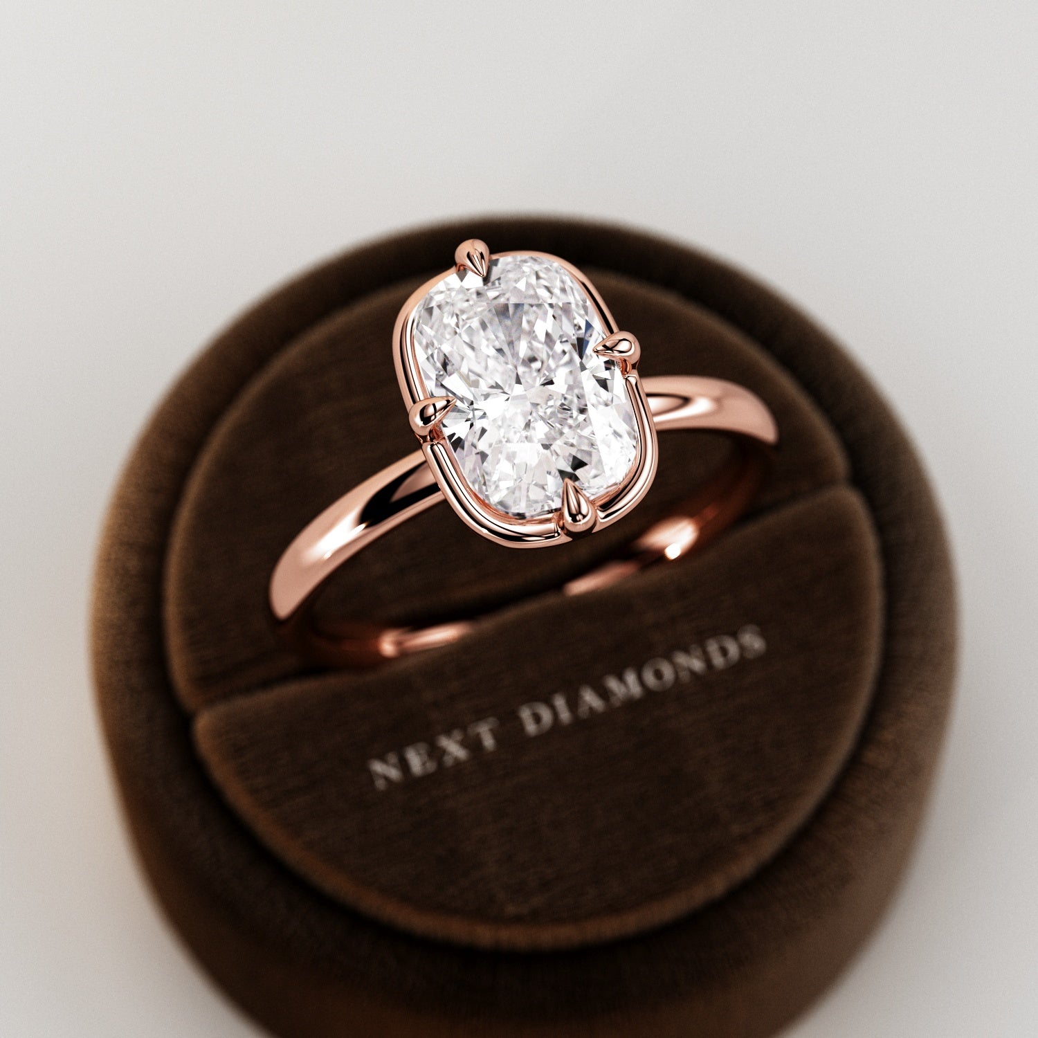 2 carat Elongated Cushion cut lab-grown diamond IGI certified, bezel engagement ring.