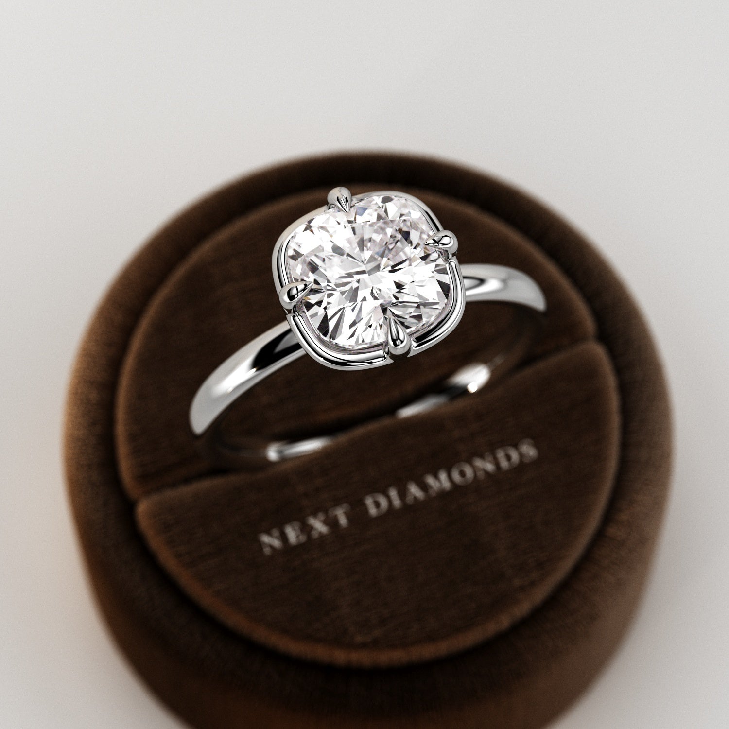 2 carat Cushion cut lab-grown diamond IGI certified, bezel engagement ring.