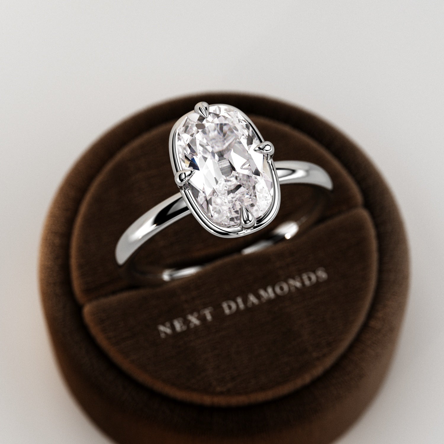 2 carat Elongated Cushion cut lab-grown diamond IGI certified, bezel engagement ring.