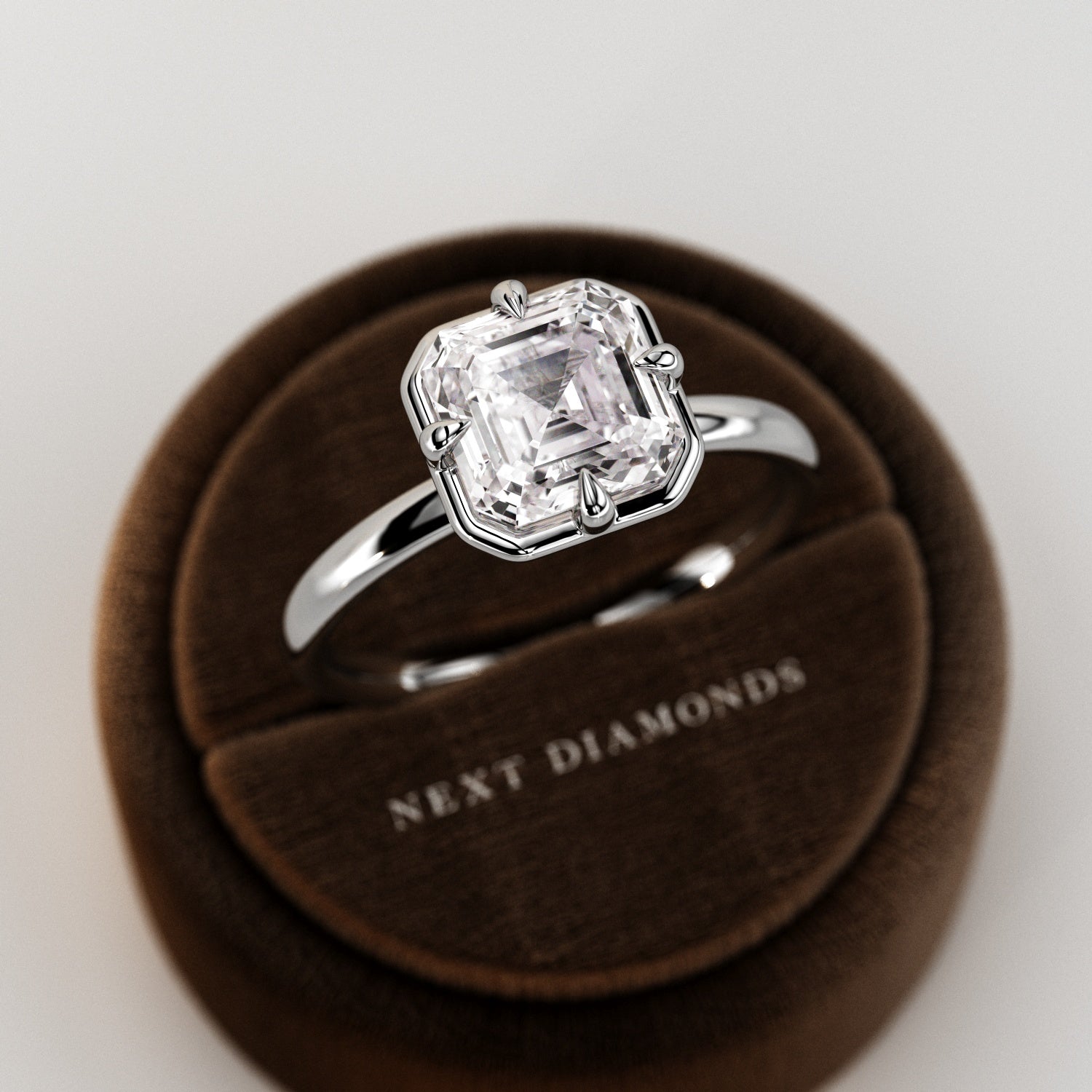 2 carat Elongated Cushion cut lab-grown diamond IGI certified, bezel engagement ring.