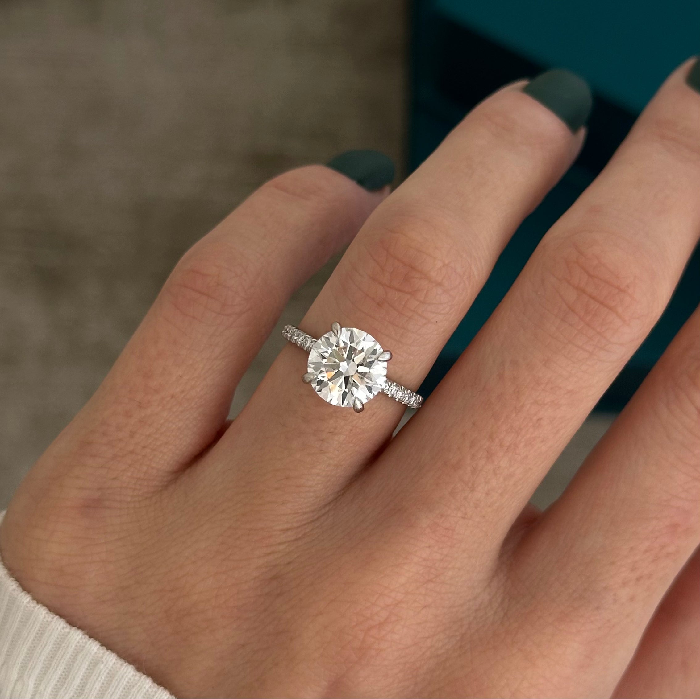 3 carat Round Brilliant cut lab-grown diamond IGI certified, hidden halo engagement ring.