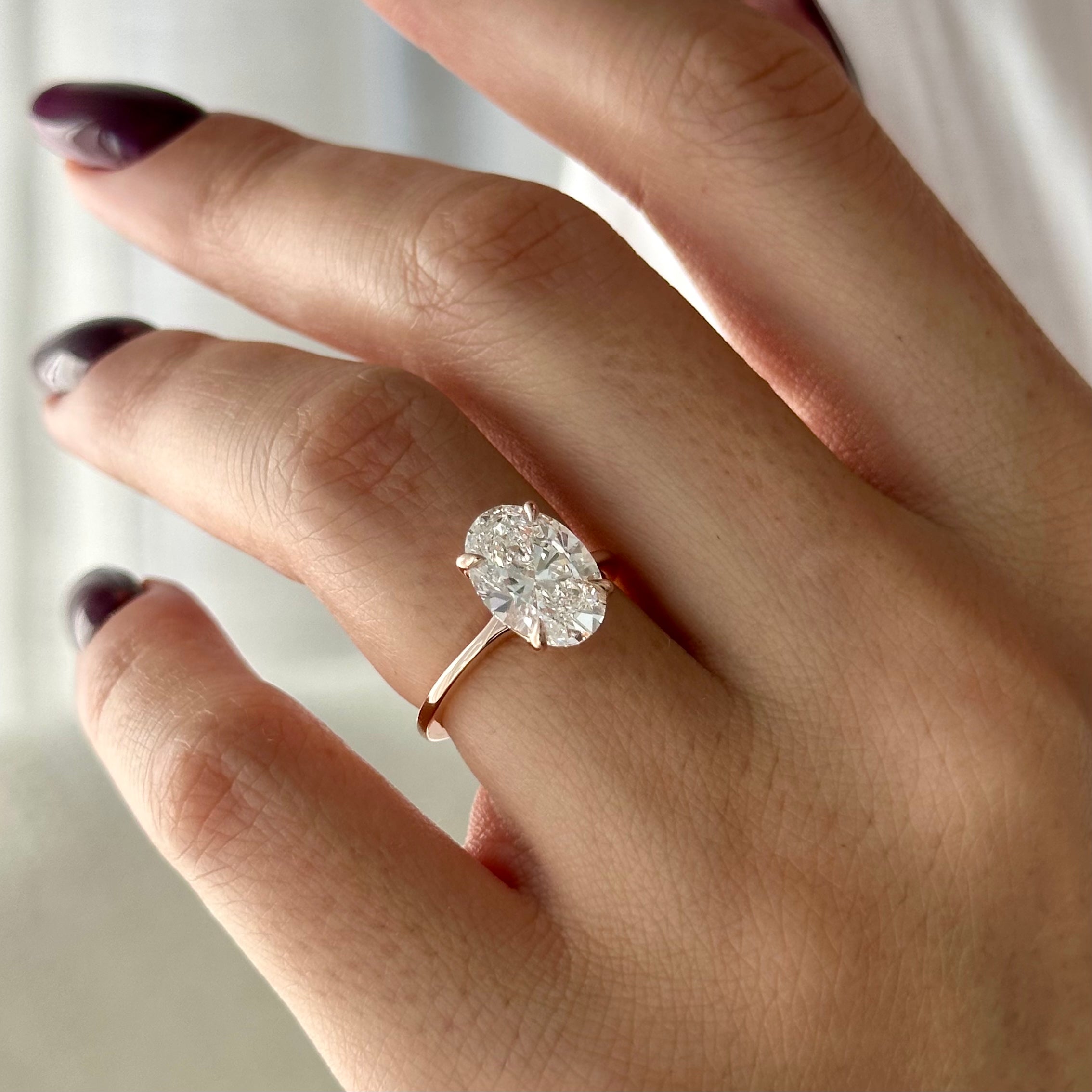3 carat Oval cut lab-grown diamond IGI certified, solitaire engagement ring.
