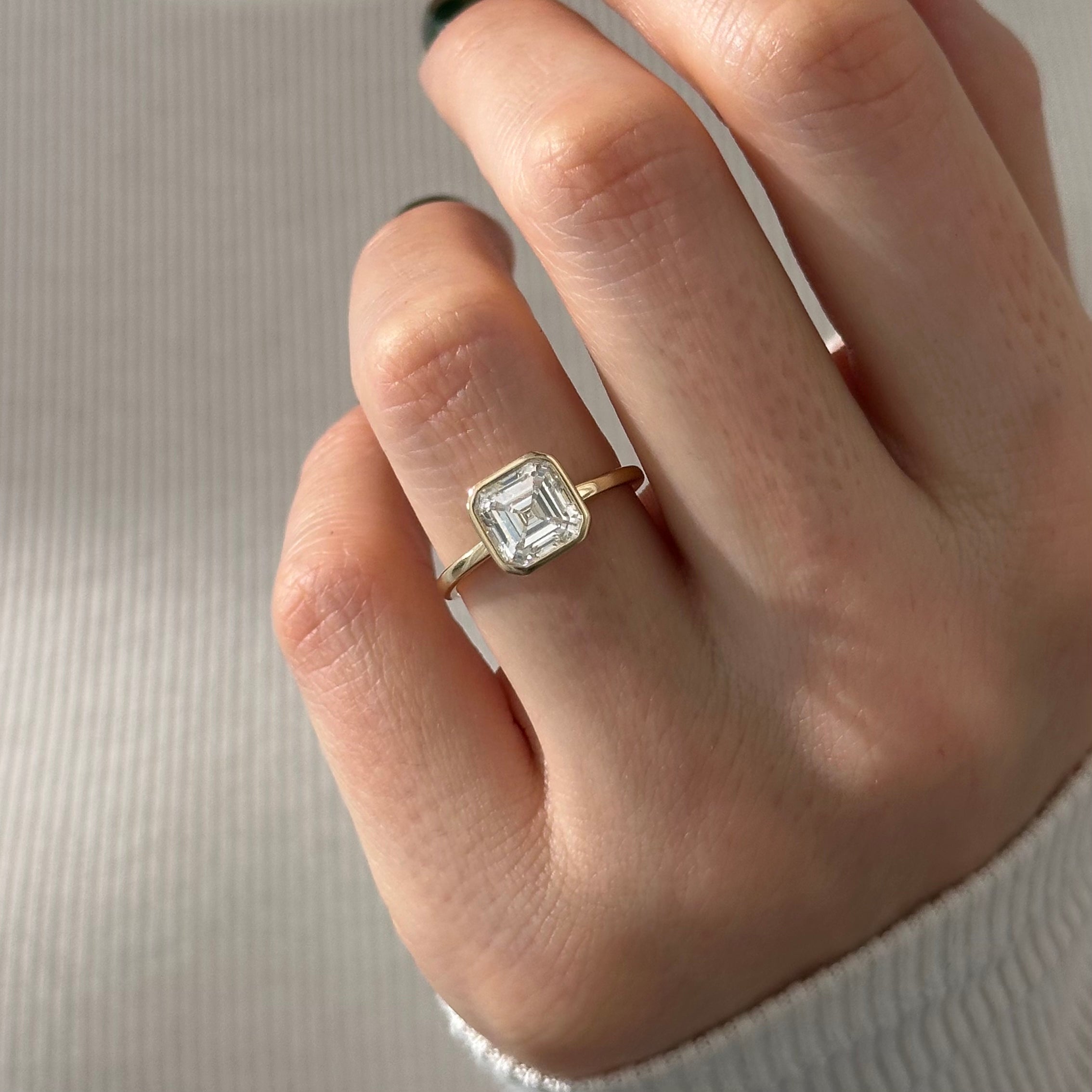 all-groups | 2 carat Asscher cut lab-grown diamond IGI certified, solitaire engagement ring.