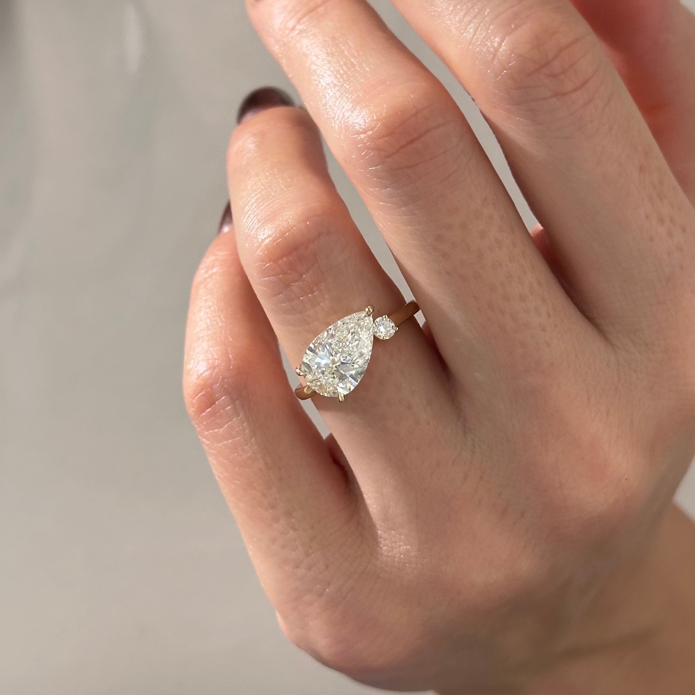 3 carat Pear cut lab-grown diamond IGI certified, side stones engagement ring.