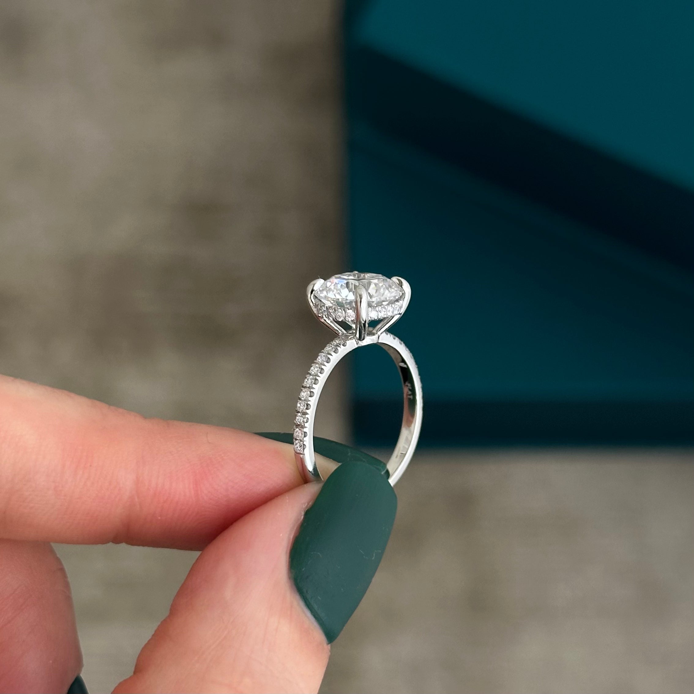 3 carat Round Brilliant cut lab-grown diamond IGI certified, hidden halo engagement ring.