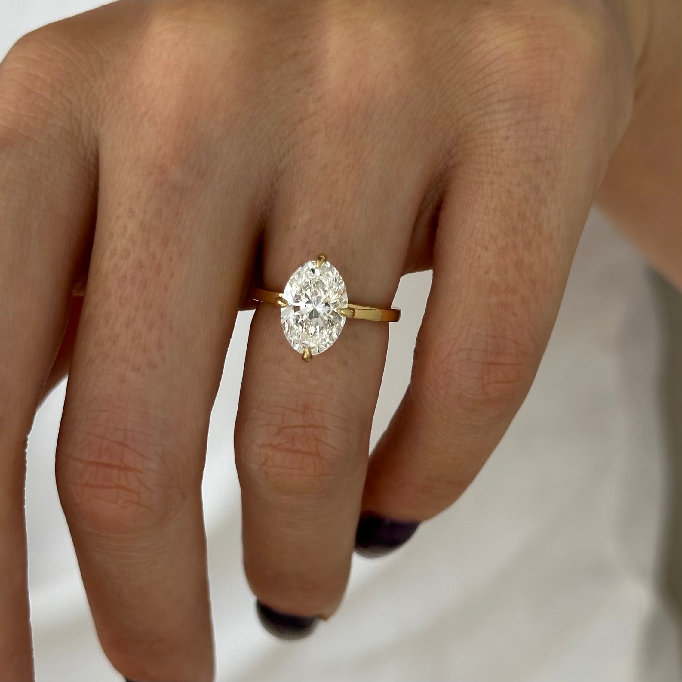 2.5 carat Oval cut lab-grown diamond IGI certified, solitaire engagement ring.