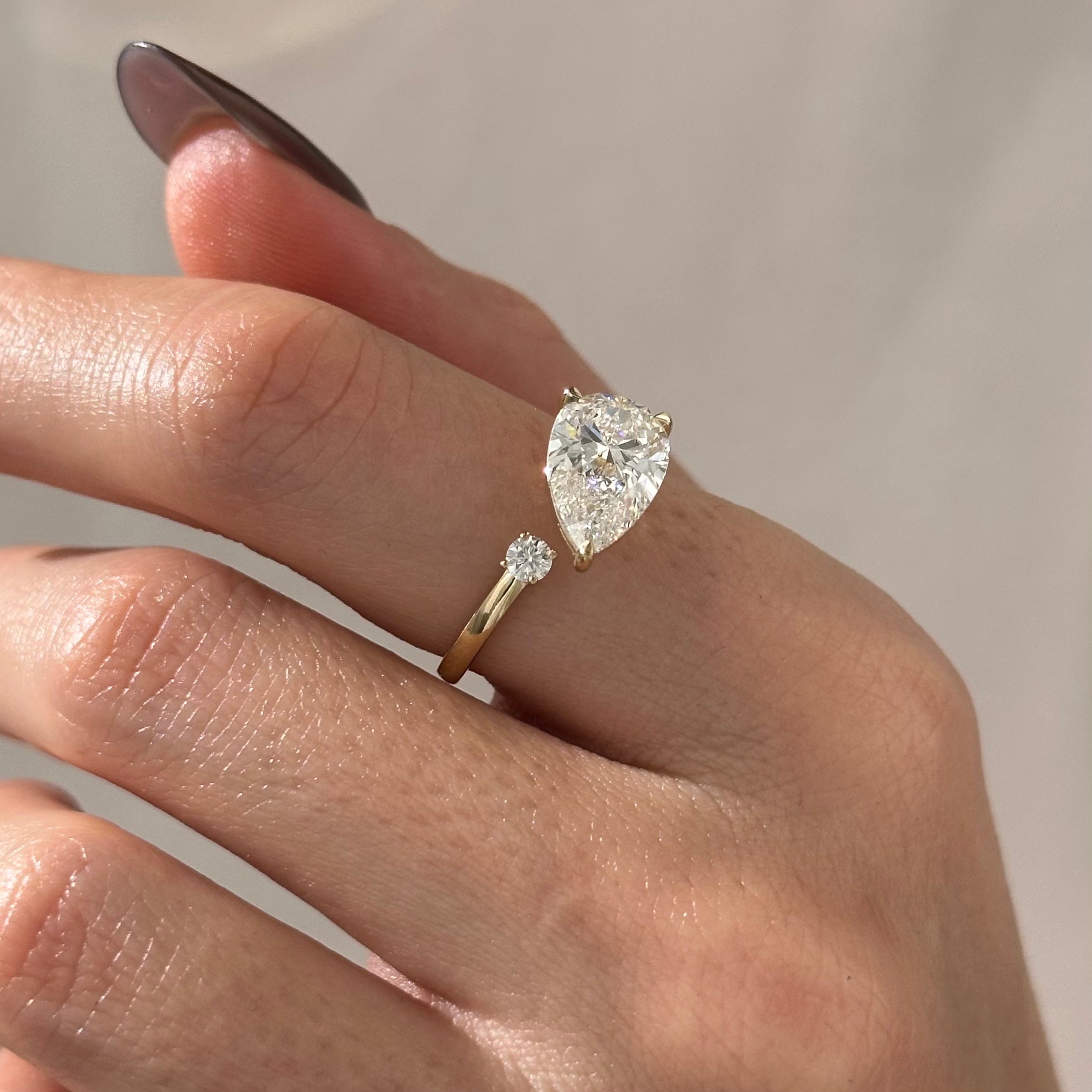 3 carat Pear cut lab-grown diamond IGI certified, side stones engagement ring.