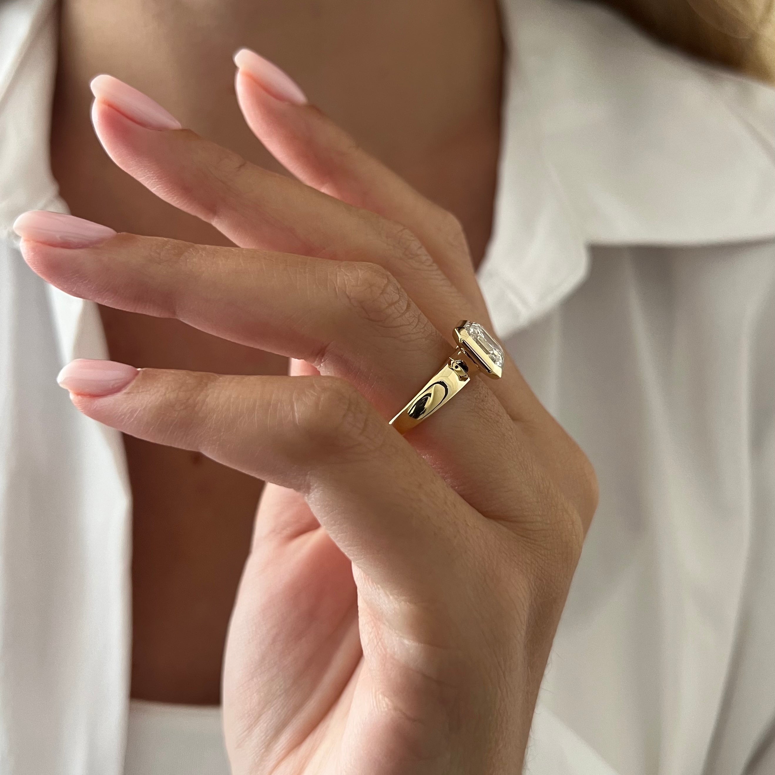 2 carat Oval cut lab-grown diamond IGI certified, bezel engagement ring.