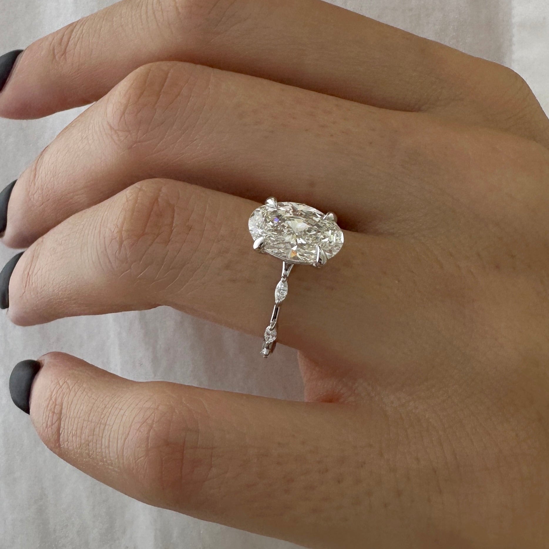 2.5 carat Oval cut lab-grown diamond IGI certified, side stones engagement ring.
