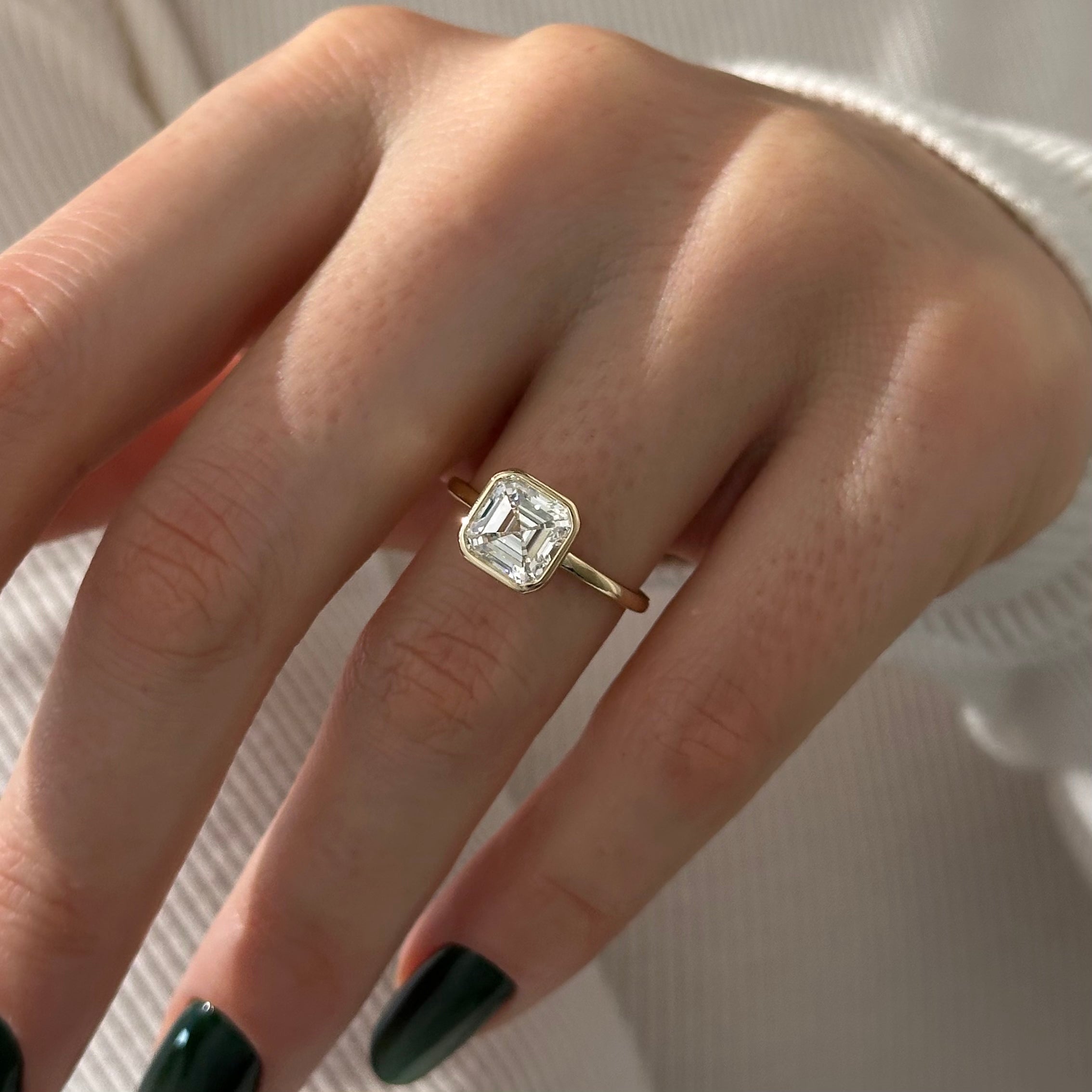 2 carat Asscher cut lab-grown diamond IGI certified, solitaire engagement ring.