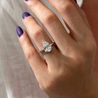 3 carat Pear cut lab-grown diamond IGI certified, hidden halo engagement ring.