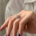 3 carat Pear cut lab-grown diamond IGI certified, hidden halo engagement ring.