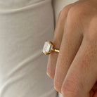 3 carat Emerald cut lab-grown diamond IGI certified, hidden halo engagement ring.