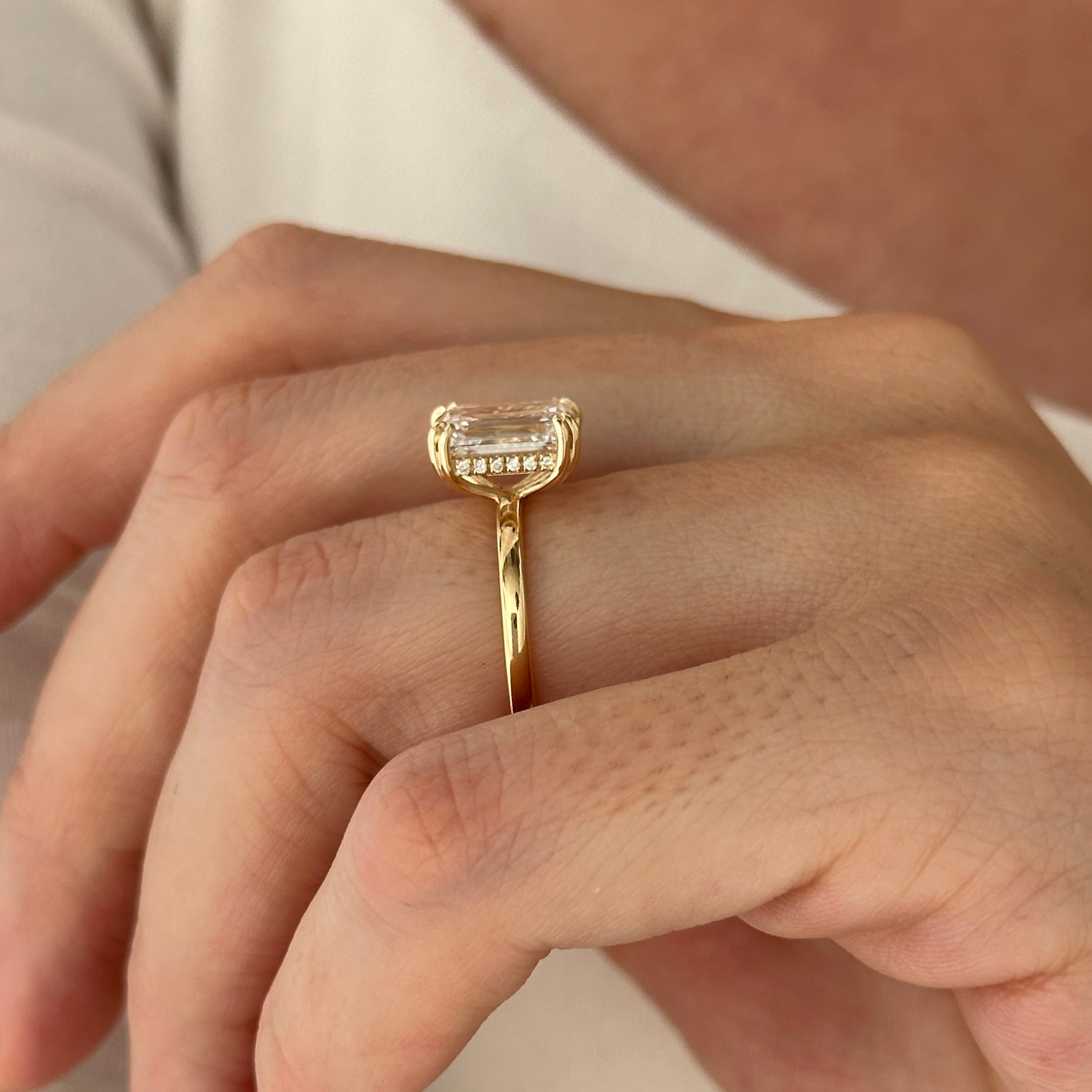 3 carat Emerald cut lab-grown diamond IGI certified, hidden halo engagement ring.
