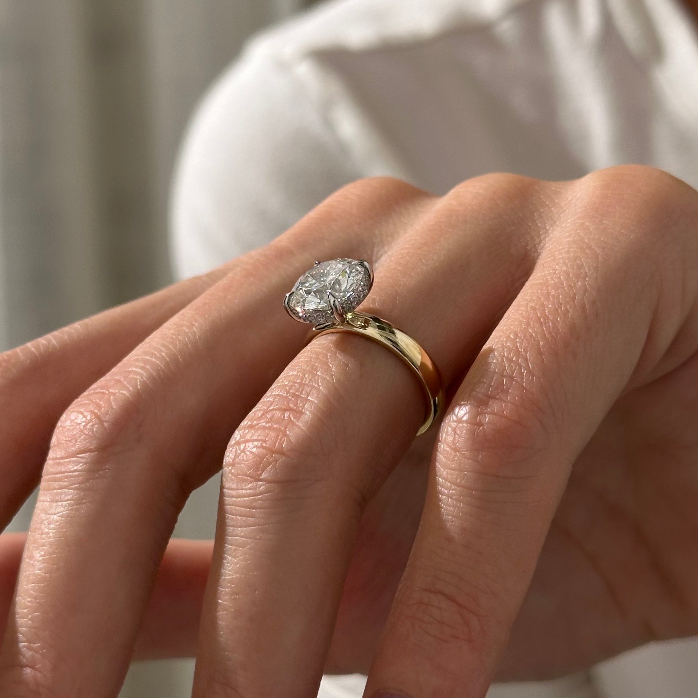 2 carat Round Brilliant cut lab-grown diamond IGI certified, hidden halo engagement ring.